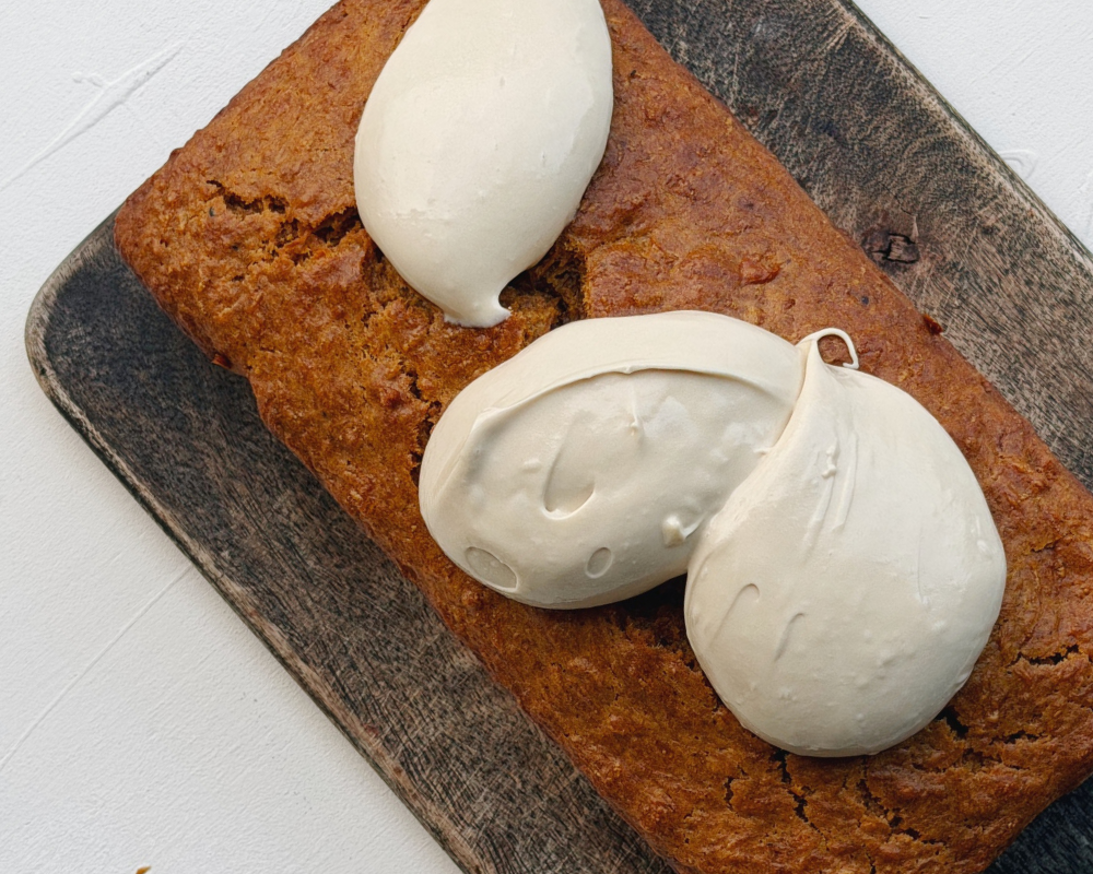 Carrot cake loaf with cream cheese frosting.png