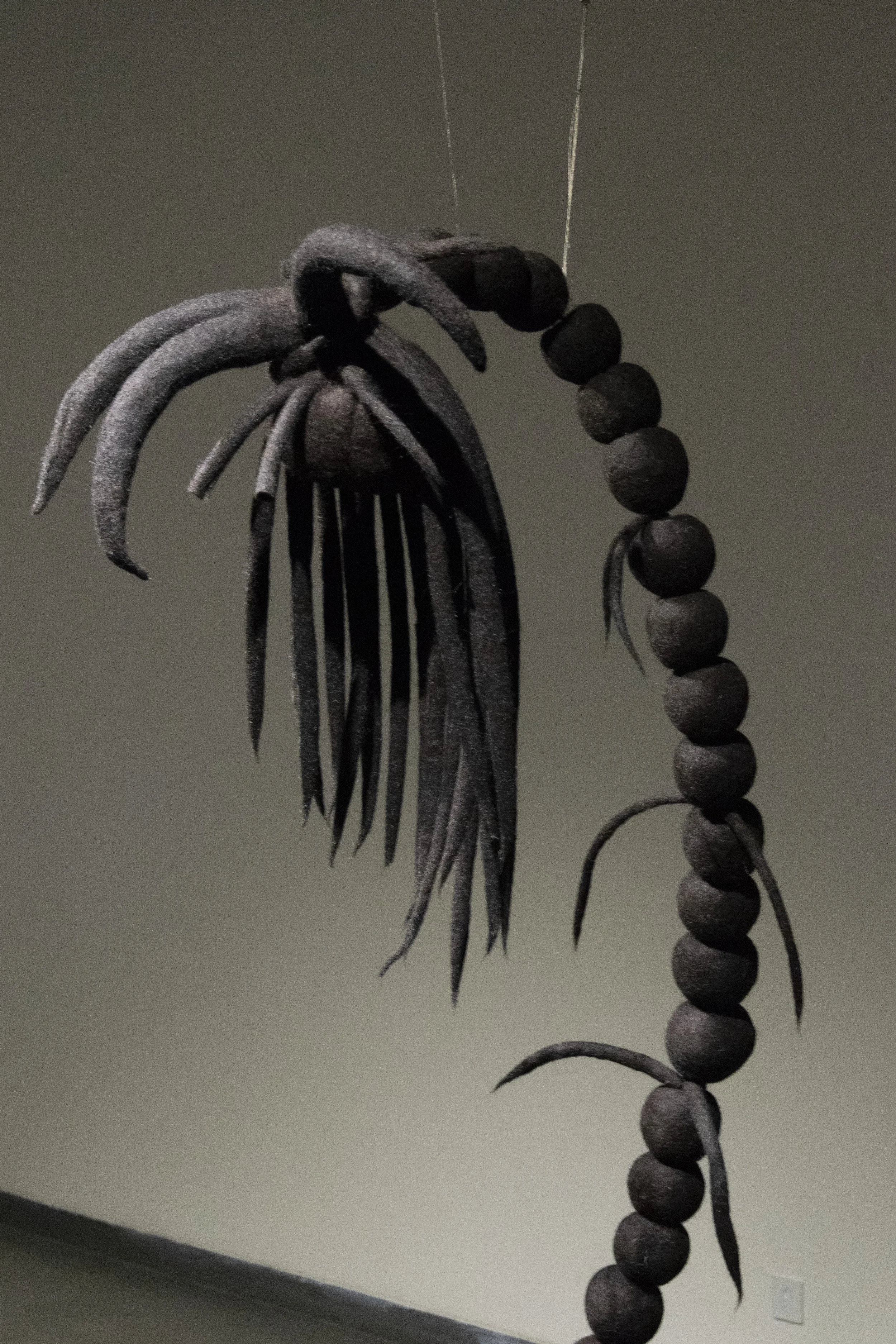 Unya sculpture made in native deccani black wool fibres hand felted. These being are future acestors from 'Shunyaverse' - a emerging mythical place. Photo credit - Sacha Parent