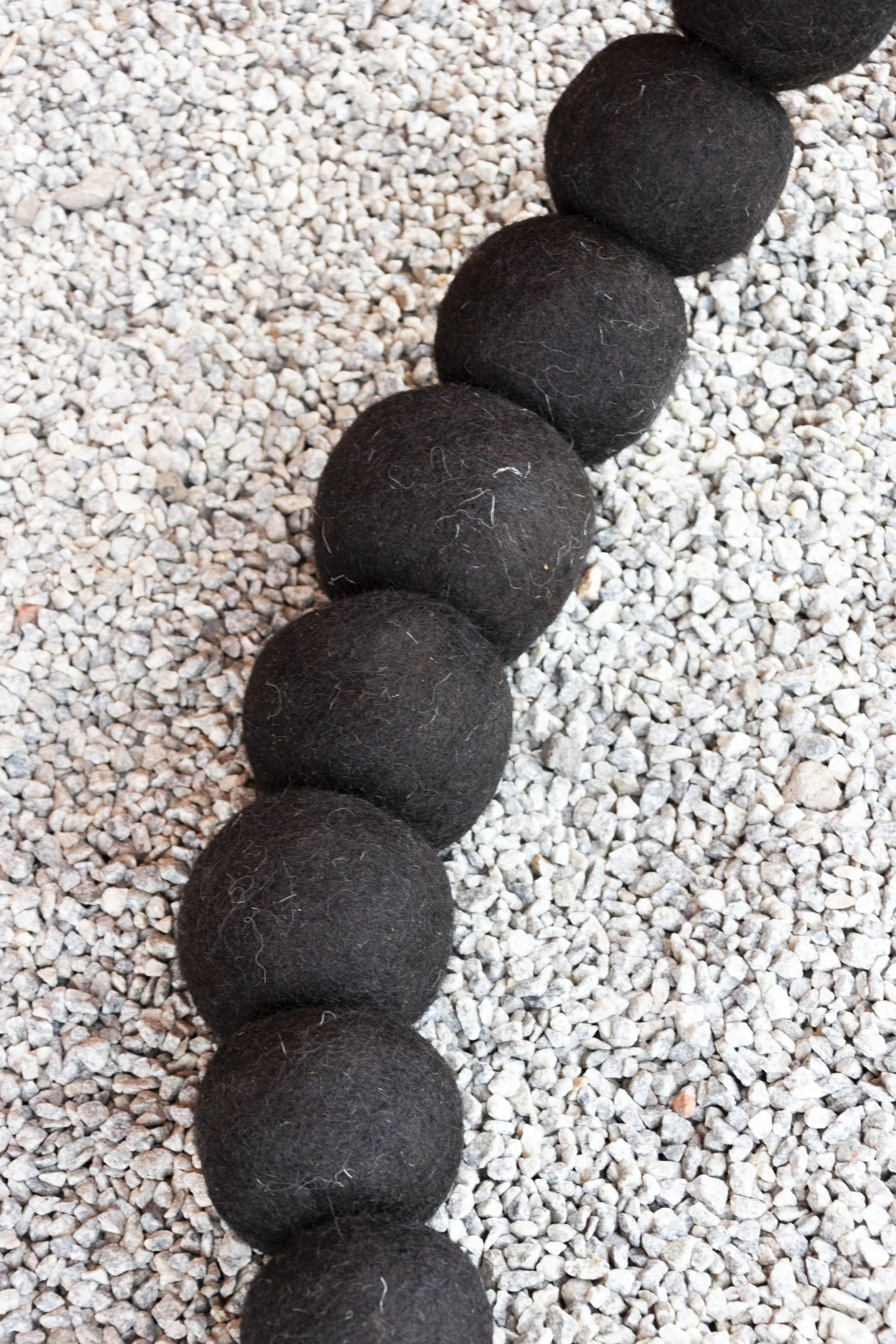 Unya sculpture made in native deccani black wool fibres hand felted. These being are future acestors from 'Shunyaverse' - a emerging mythical place. Photo credit - Sacha Parent