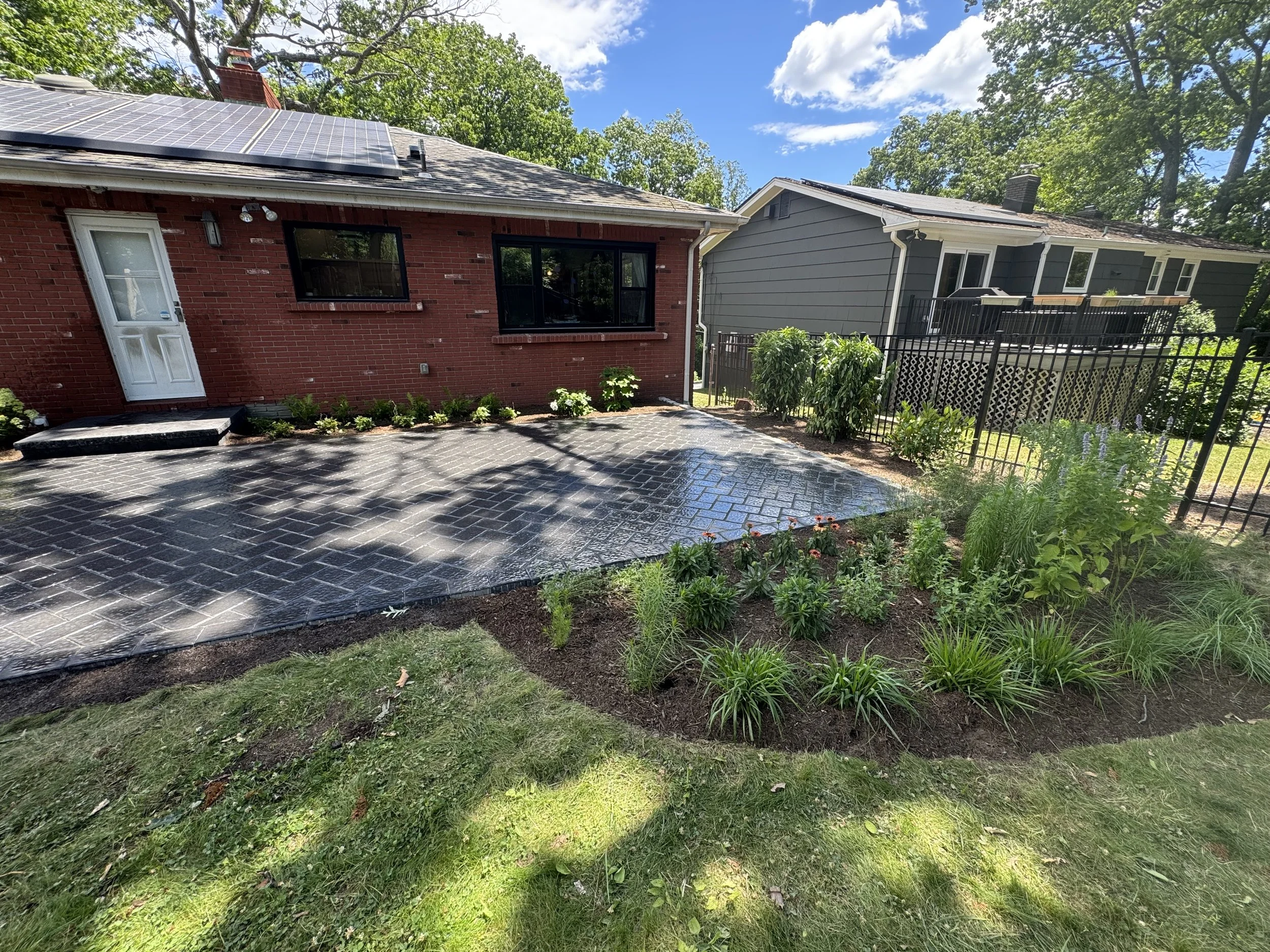 A new patio expands the usable outdoor space.