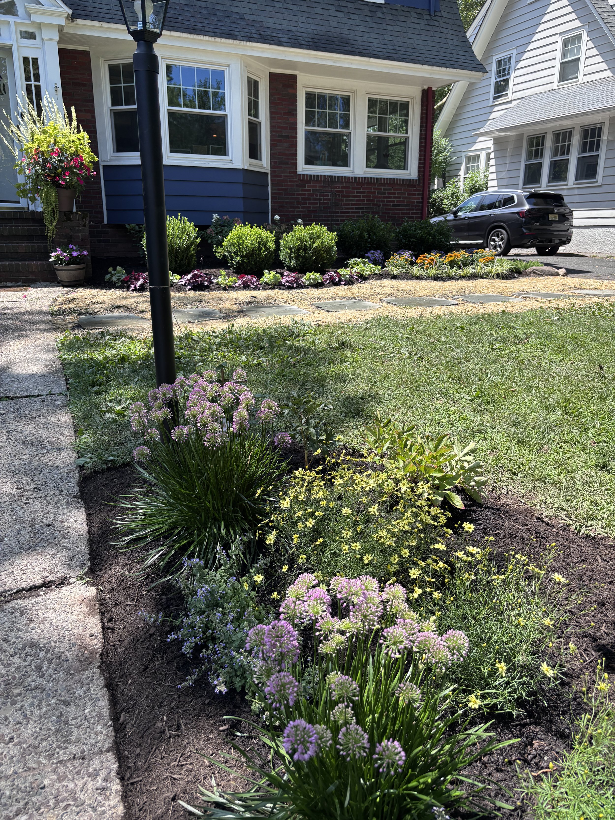 New lamp post and garden bed to complement.
