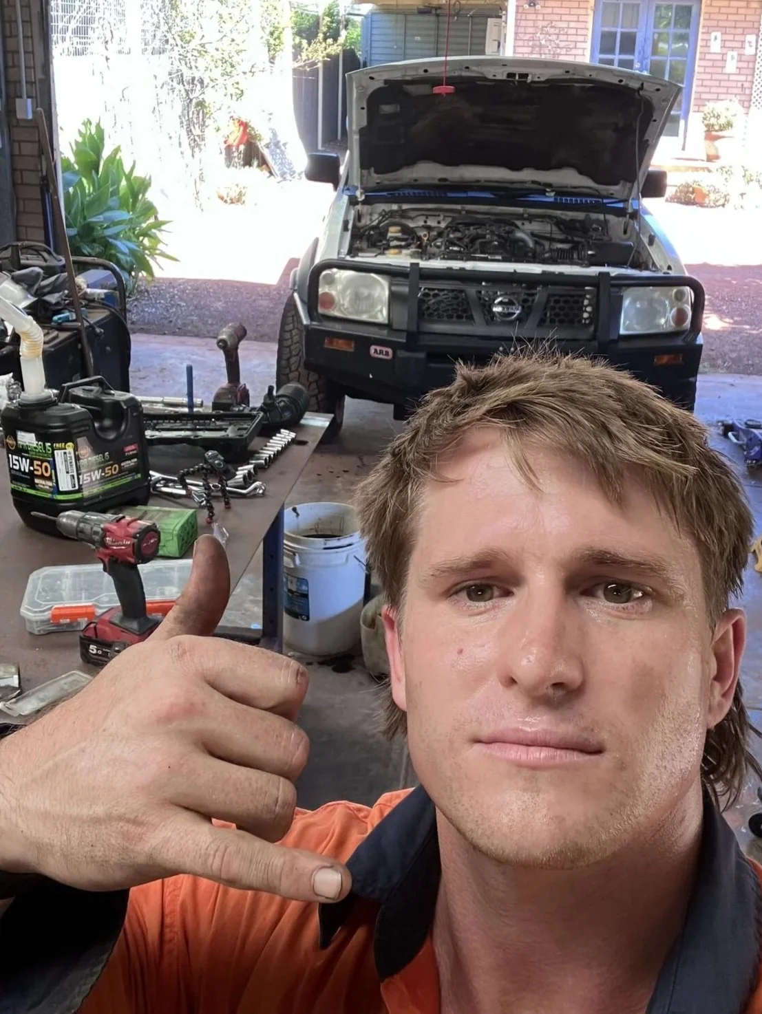 Adam in garage selfi