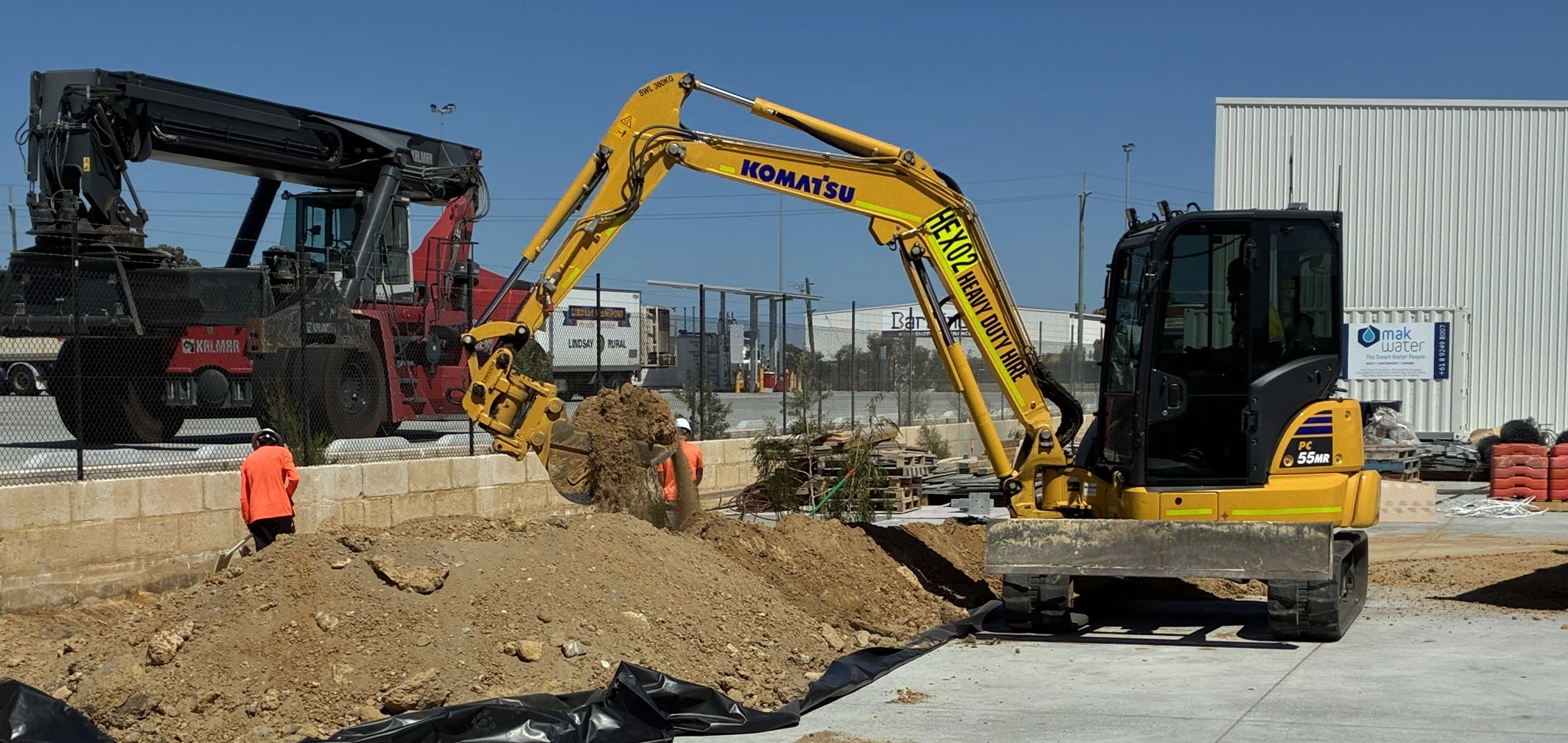 Komatsu PC55 5 tonne excavator on a sandy civil site