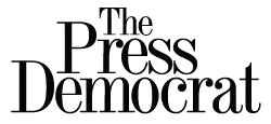Text reading 'The Press Democrat' on a black background.