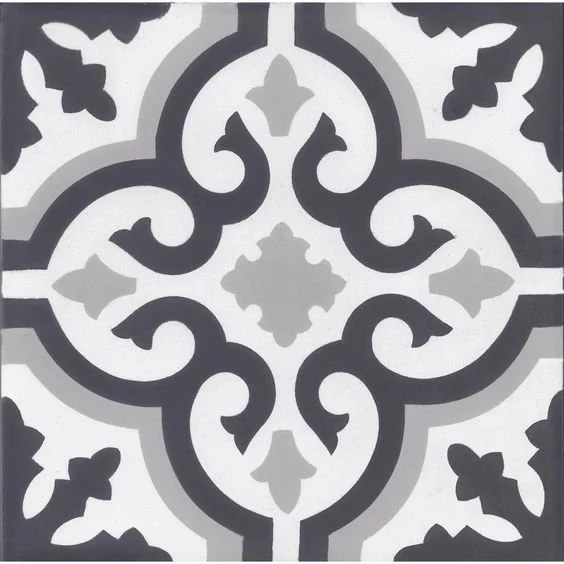 Black and white intricate geometric tile pattern with symmetrical swirling designs.