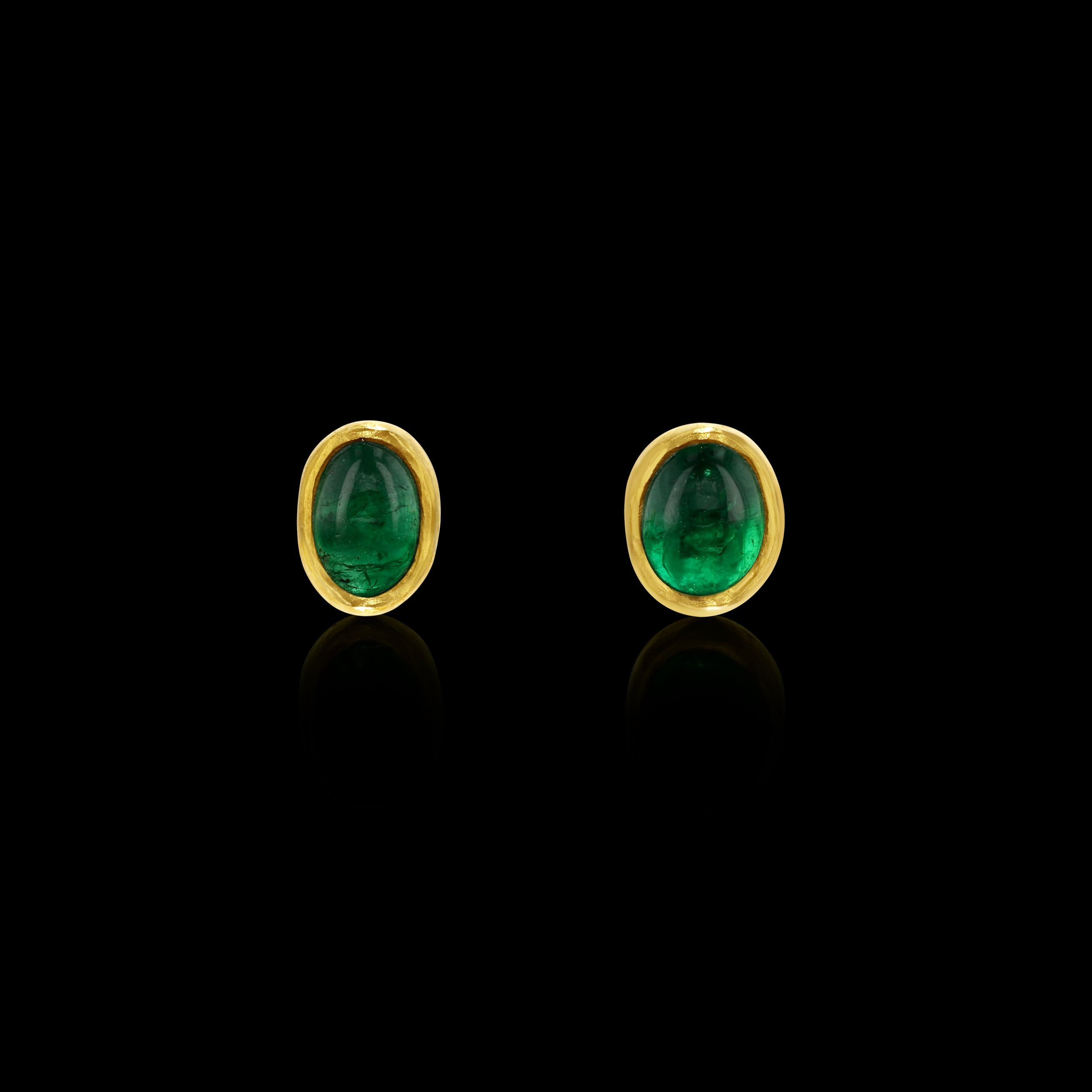 Small emerald studs
