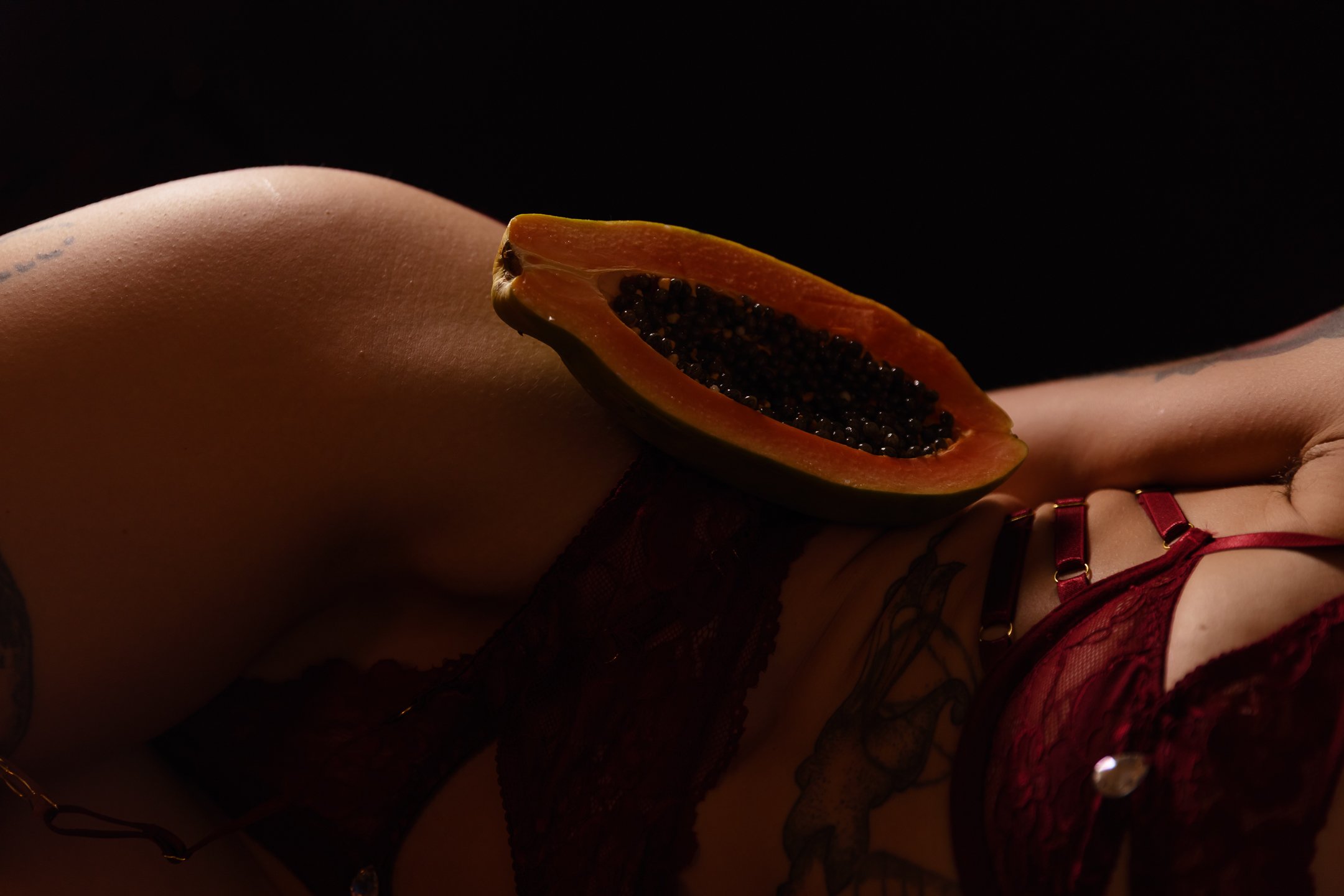 Valerie Sky _ Your Unconventional Lover _ Woman's side in red lingerie with a papaya on the hip.jpg