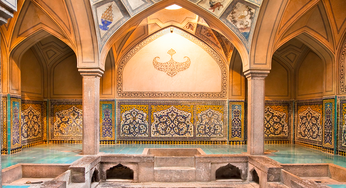 An image of a colorful, intricate walls of a hammam