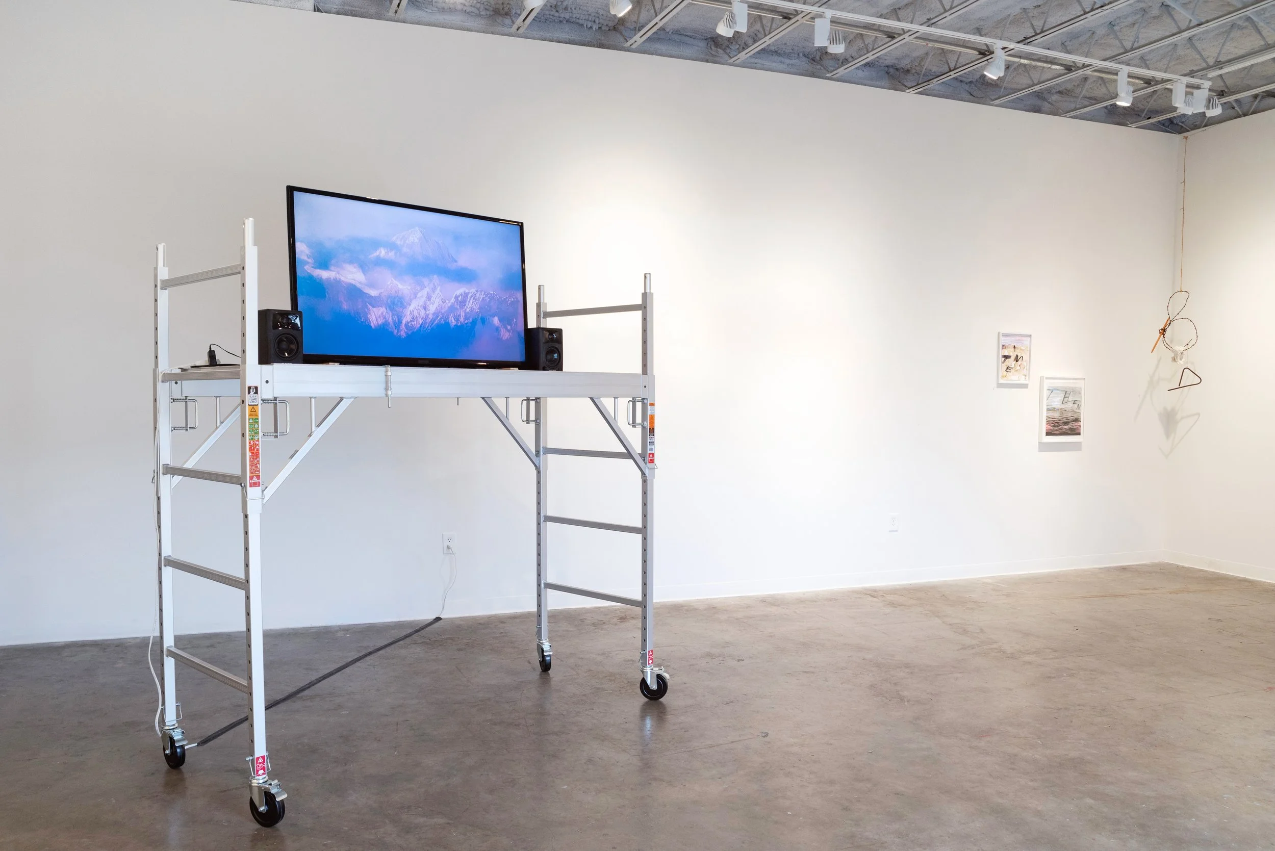   Mountain (poster with fog machine) , video, sound, speakers, scaffold  