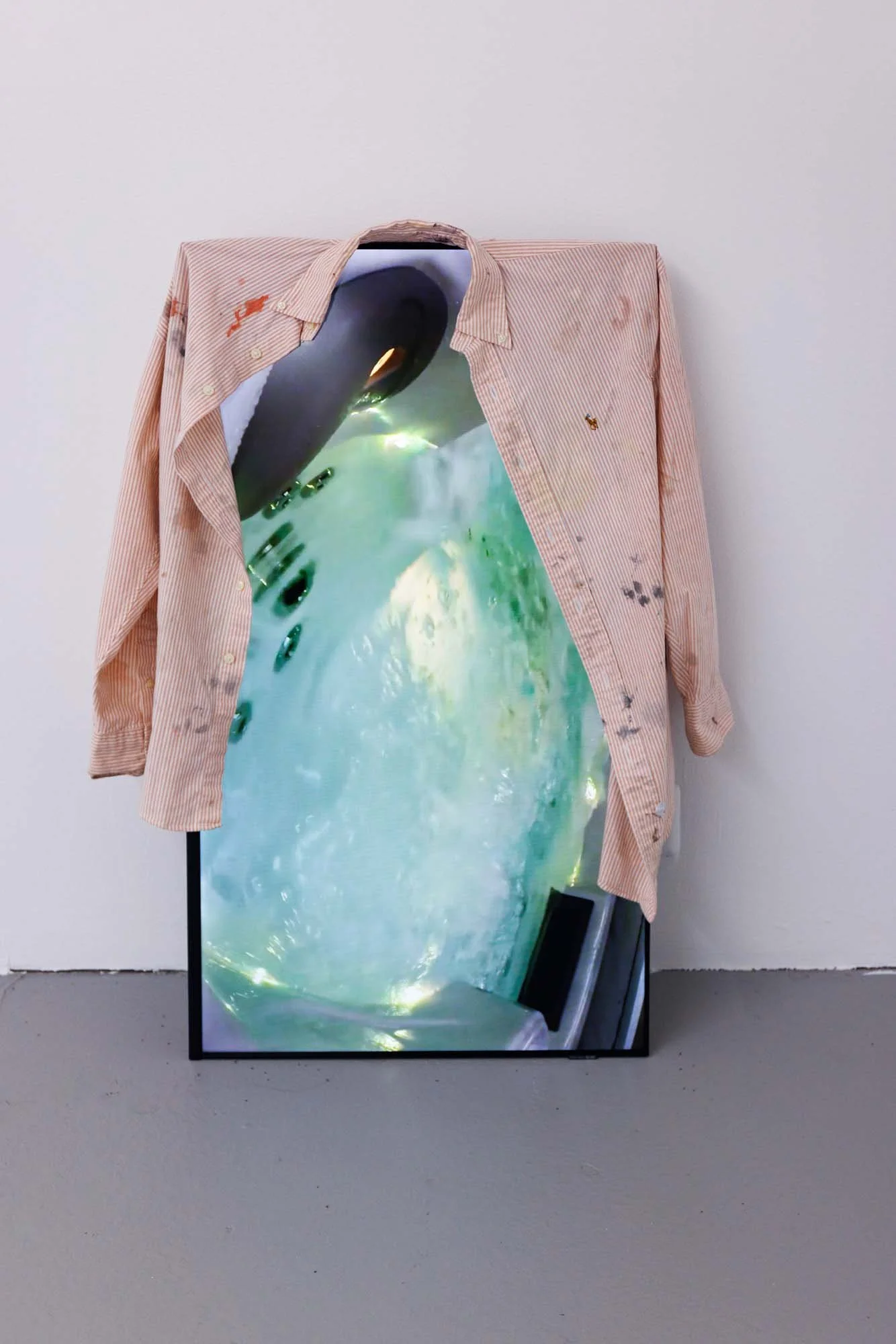   Jacuzzi , found video, father's work shirt worn in studio, paint 