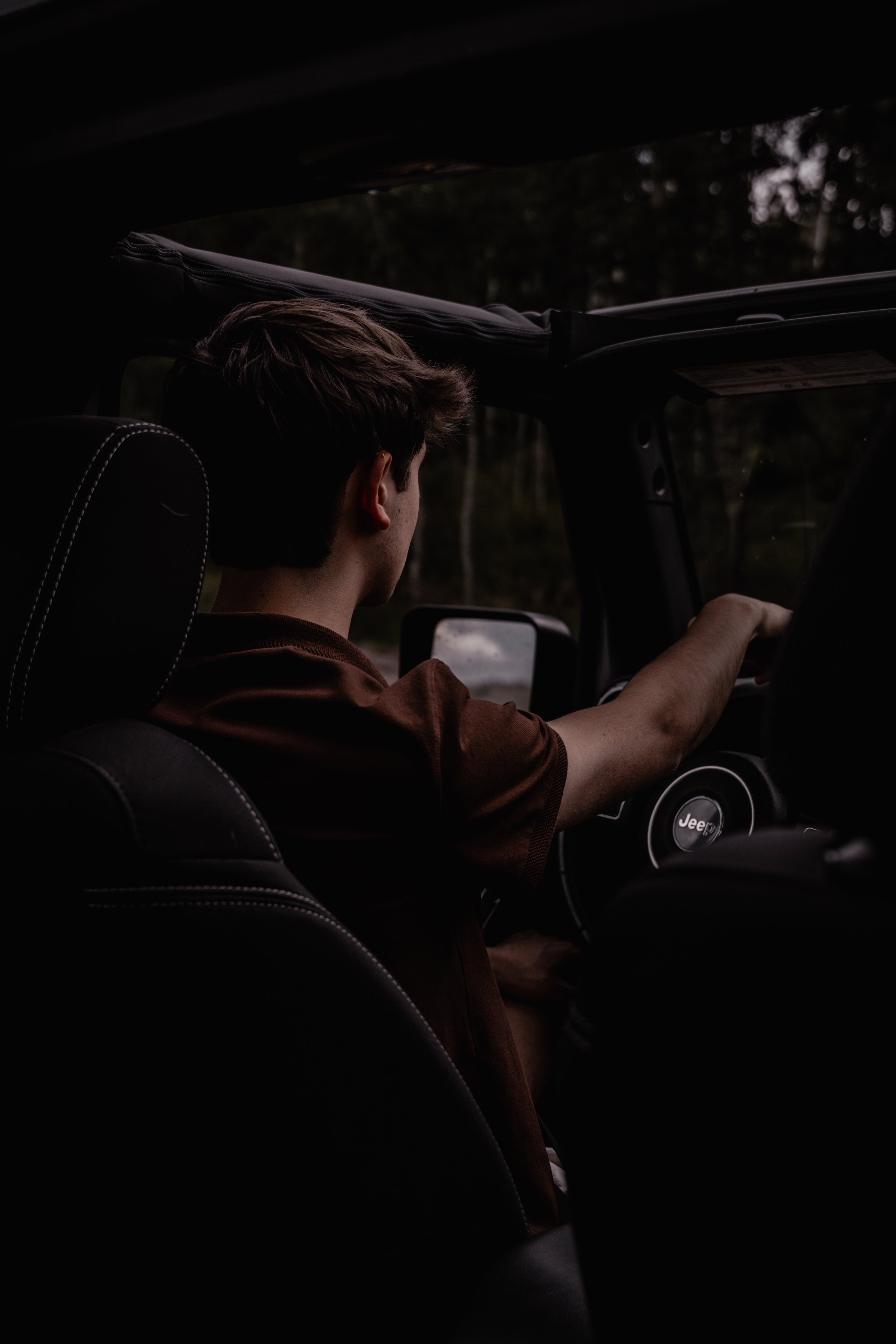 Judah Jeep Backseat Driving Dark.jpg