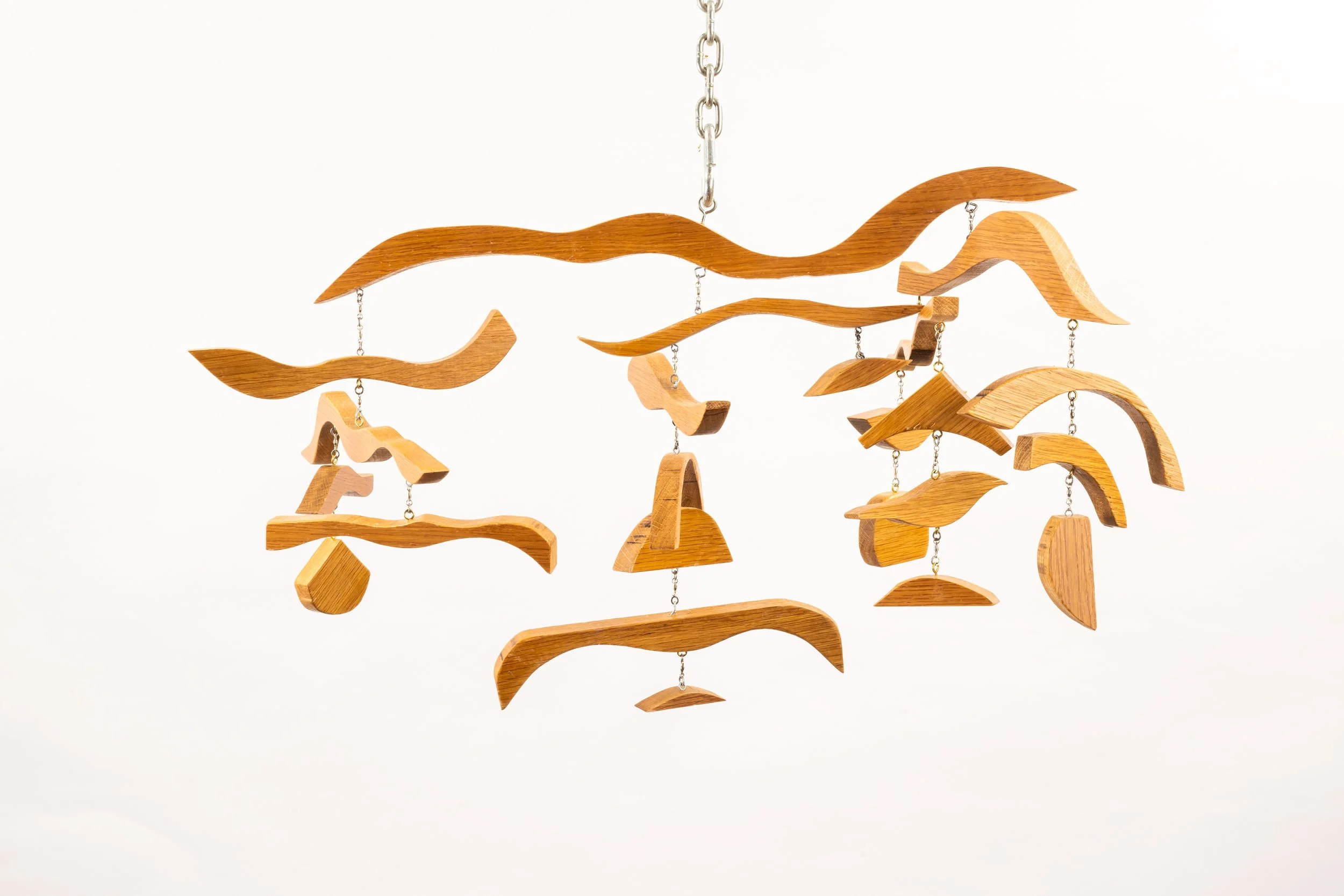 WIND / 2023/
Mobile/
37" x 13" /
Materials: wood, lacquer, eyebolts, barrel swivels
Challenged to use animate, gather, and superfluidity, as inspiration, I swiftly identified these terms as a perfect description of a mobile.