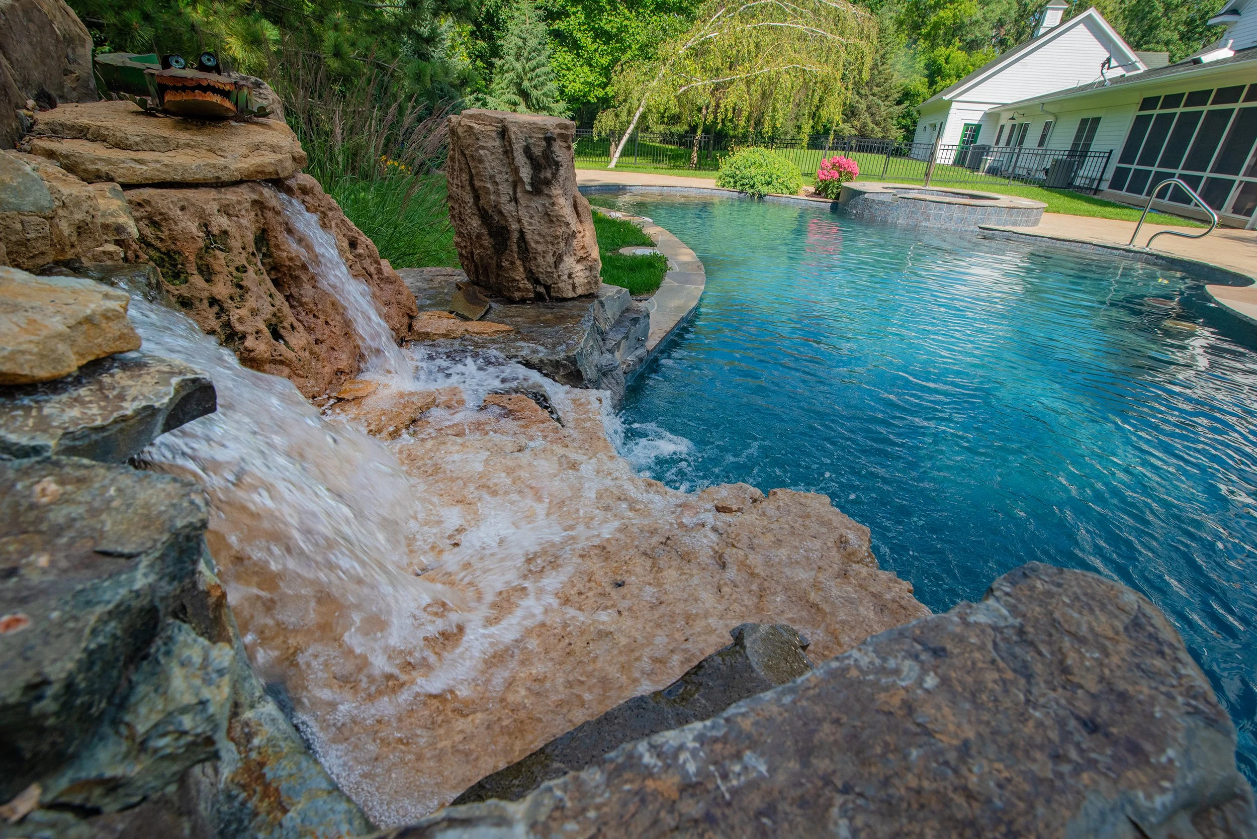 Luxurious water feature and shotcrete inground pool in Algonquin Illinois