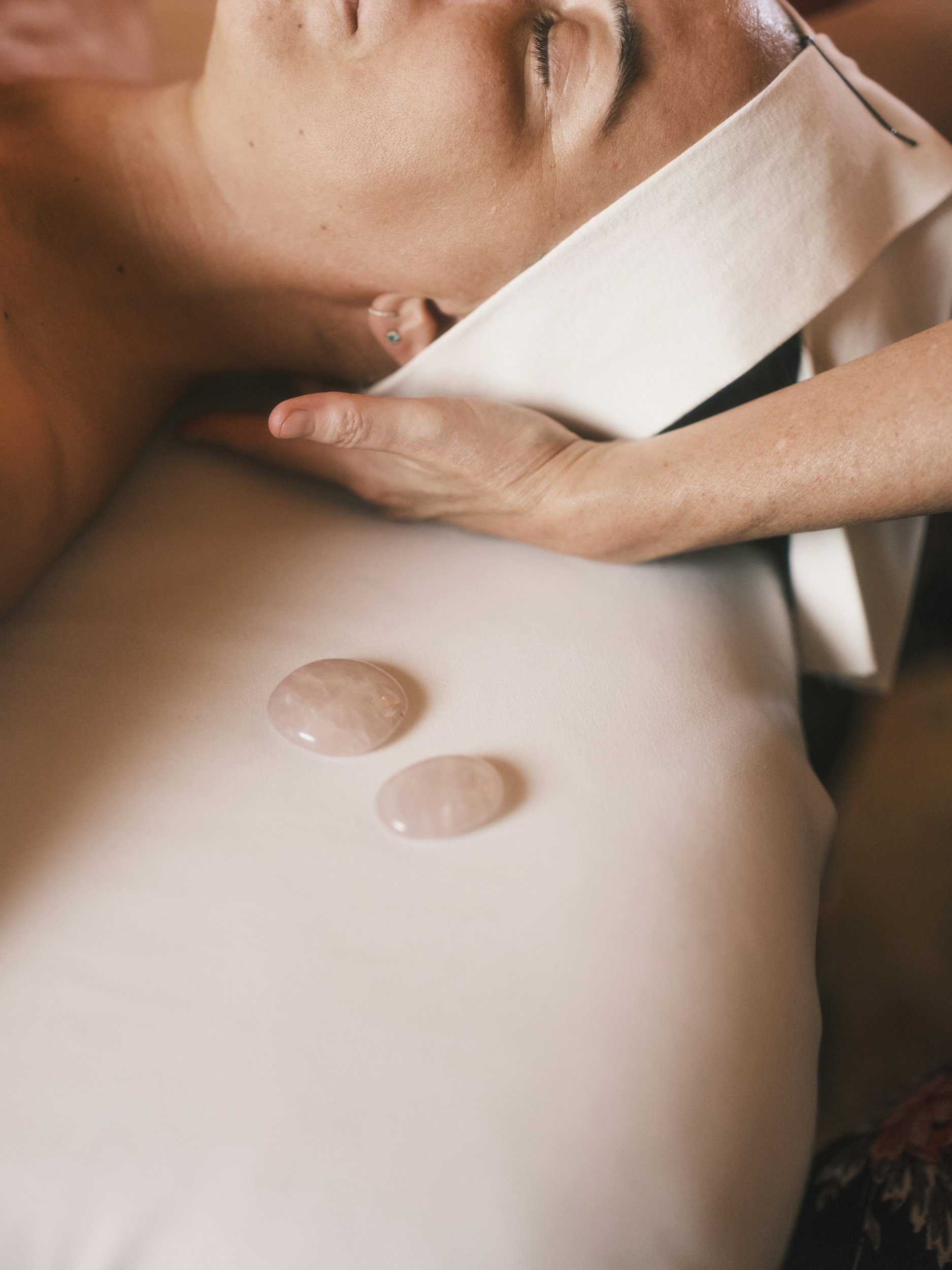 Client receiving a facial treatment at Le Spa Orla