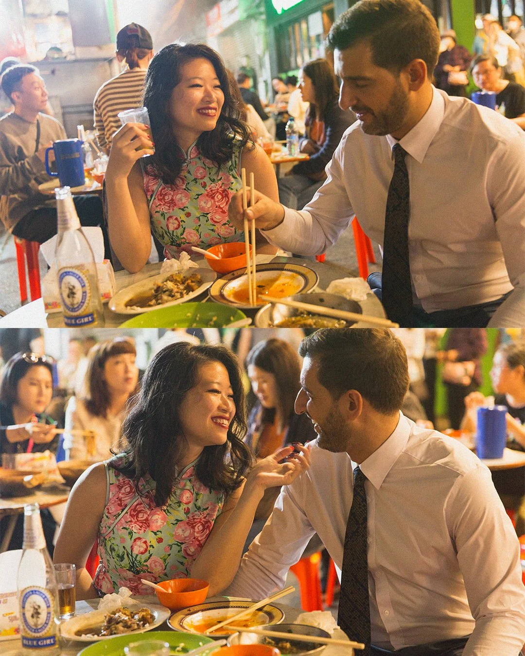 A woman and a man sharing a meal at a lively restaurant, smiling and enjoying each other's company, with food and drinks on the table.