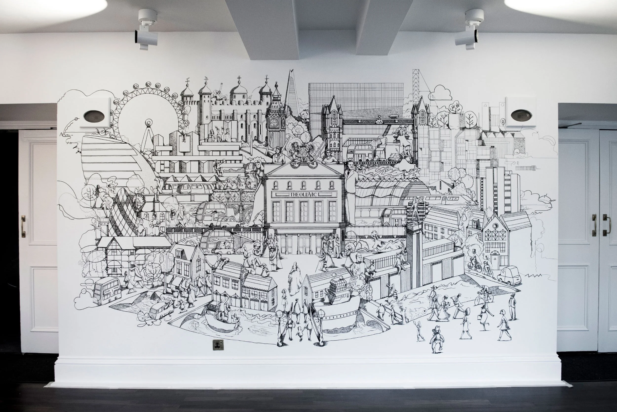Hand-painted large-scale mural installation by Chris Martin illustrator – black ink drawing of London cityscape featuring The Old Vic Theatre, London Eye, Tower of London, Big Ben and street characters, installed in The Old Vic Theatre bar London