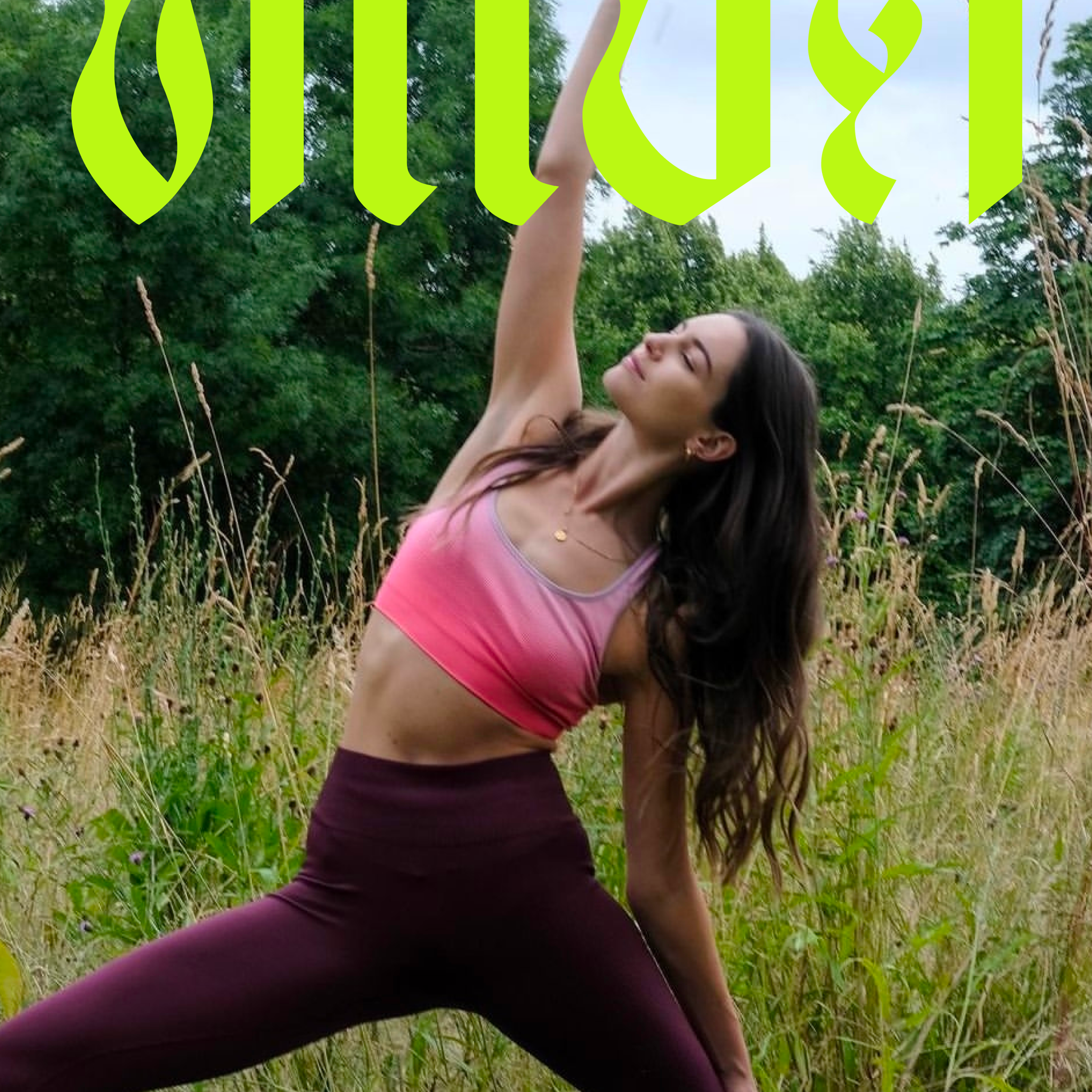 A young woman in a pink sports bra and dark leggings practicing yoga outdoors in a grassy field surrounded by trees, performing a side bend pose with her eyes closed.