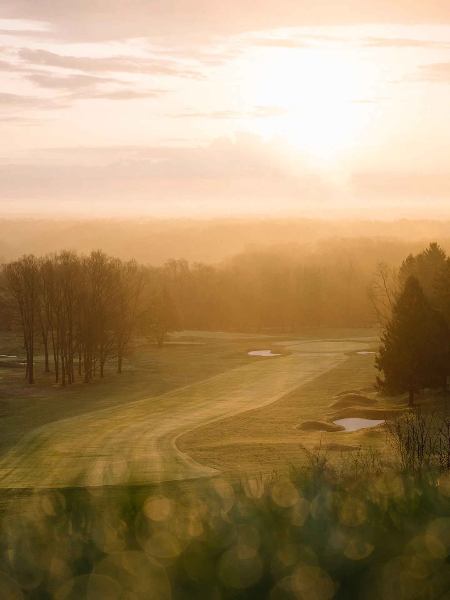 🌅&hellip; spring mornings often create a special kind of light, where cool overnight temperatures and rising warmth leave just enough haze to catch the first sunlight and carry it gently across the course. A quiet sign of opening day around the corn
