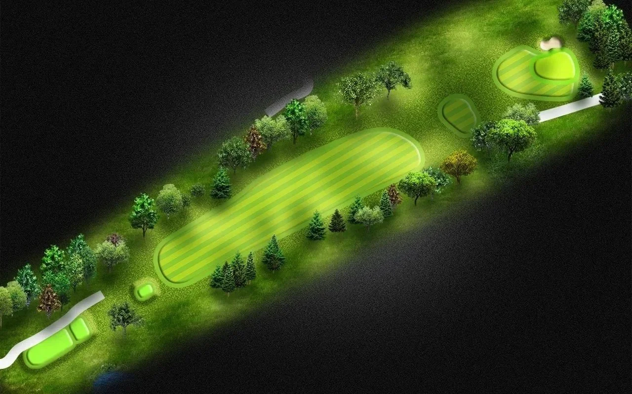 Night aerial view of a golf course hole with fairway, greens, trees, and sand traps, surrounded by a dark landscape.