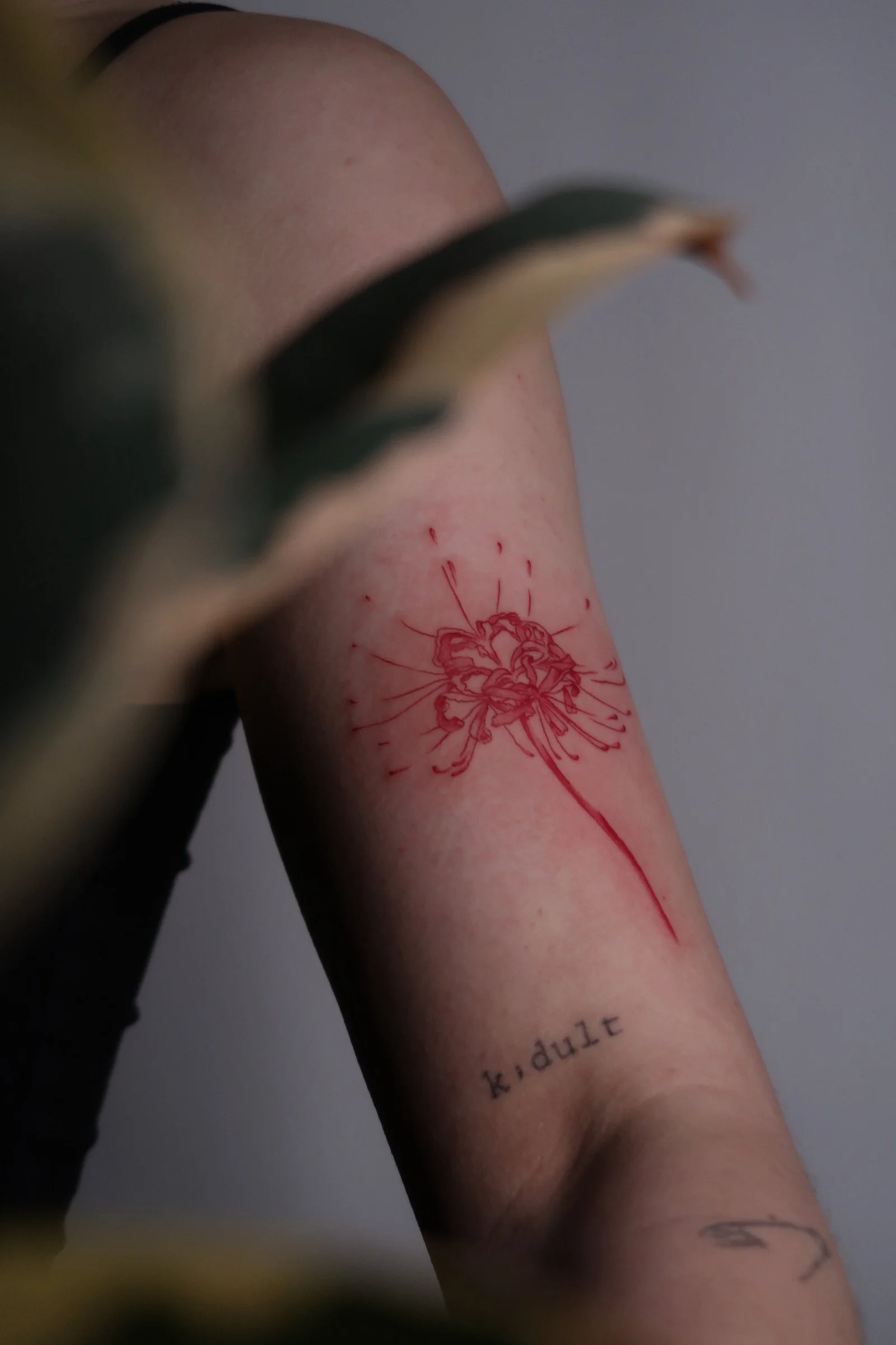 Red spider lily tattoo.