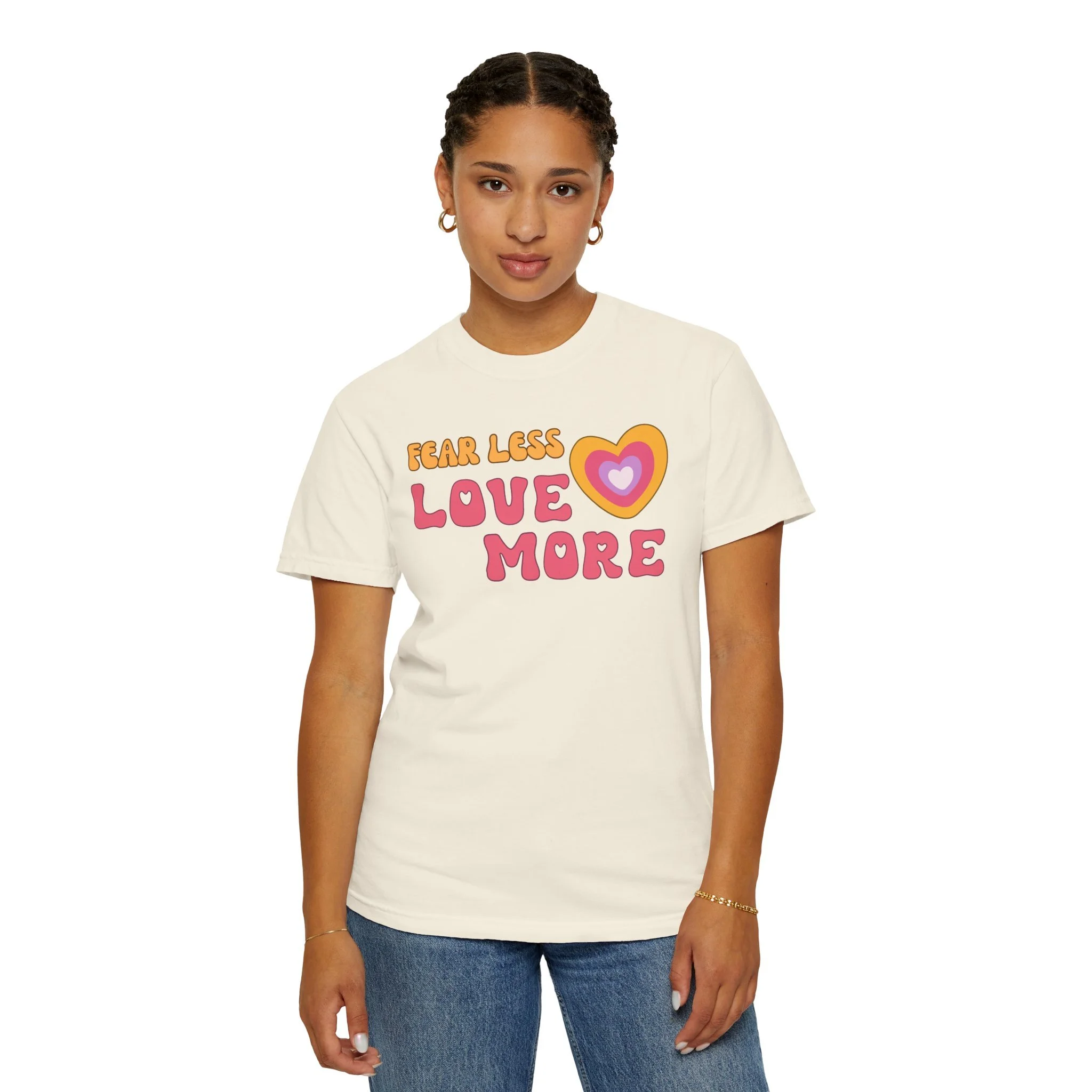 Comfort colors graphic T-shirt with retro font that says live more fearless and graphic of retro style heart