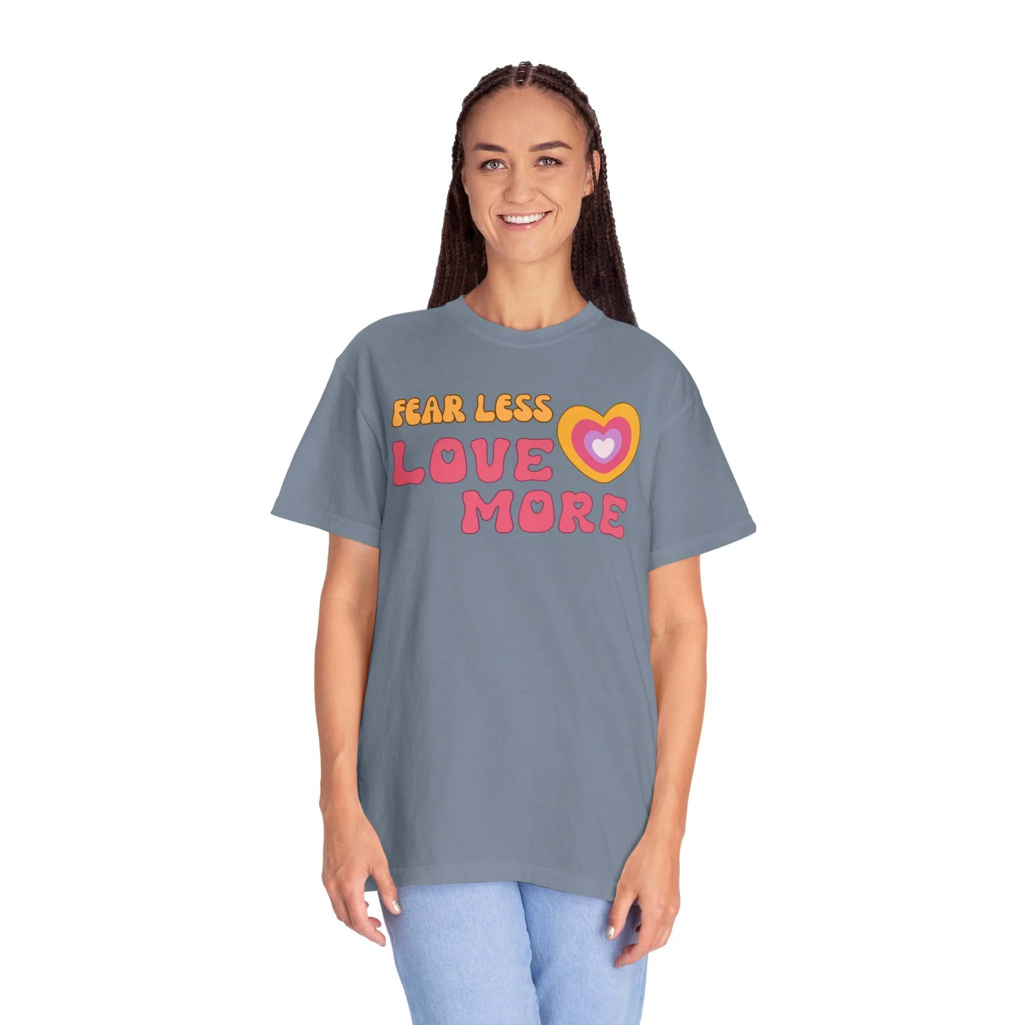 Comfort colors graphic T-shirt with retro font that says live more fearless and graphic of retro style heart