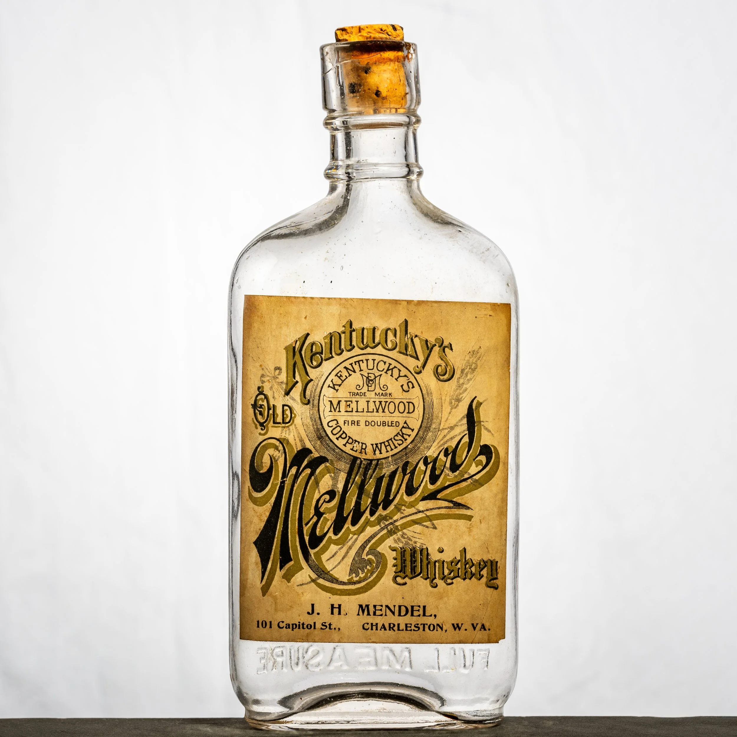 J.H. Mendel, Kentucky's Mellwood Whiskey, Charleston labeled whiskey bottle. 