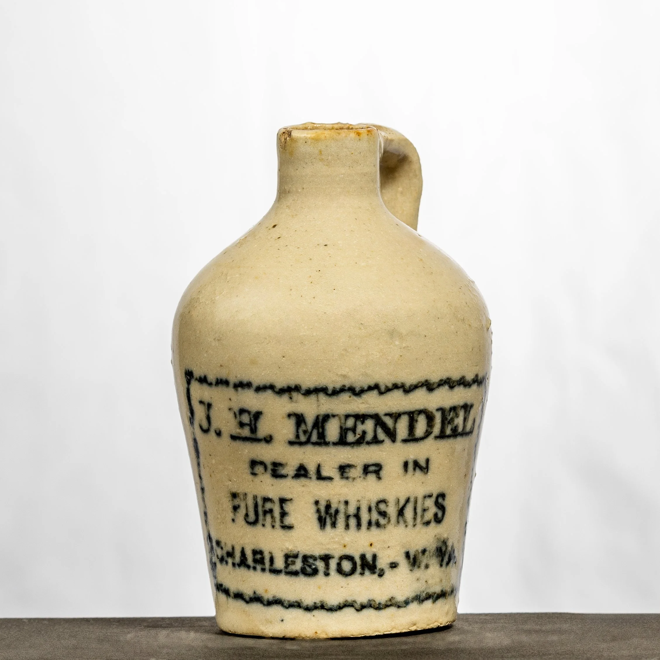 J.H. Mendel, Charleston mini stoneware whiskey jug. 