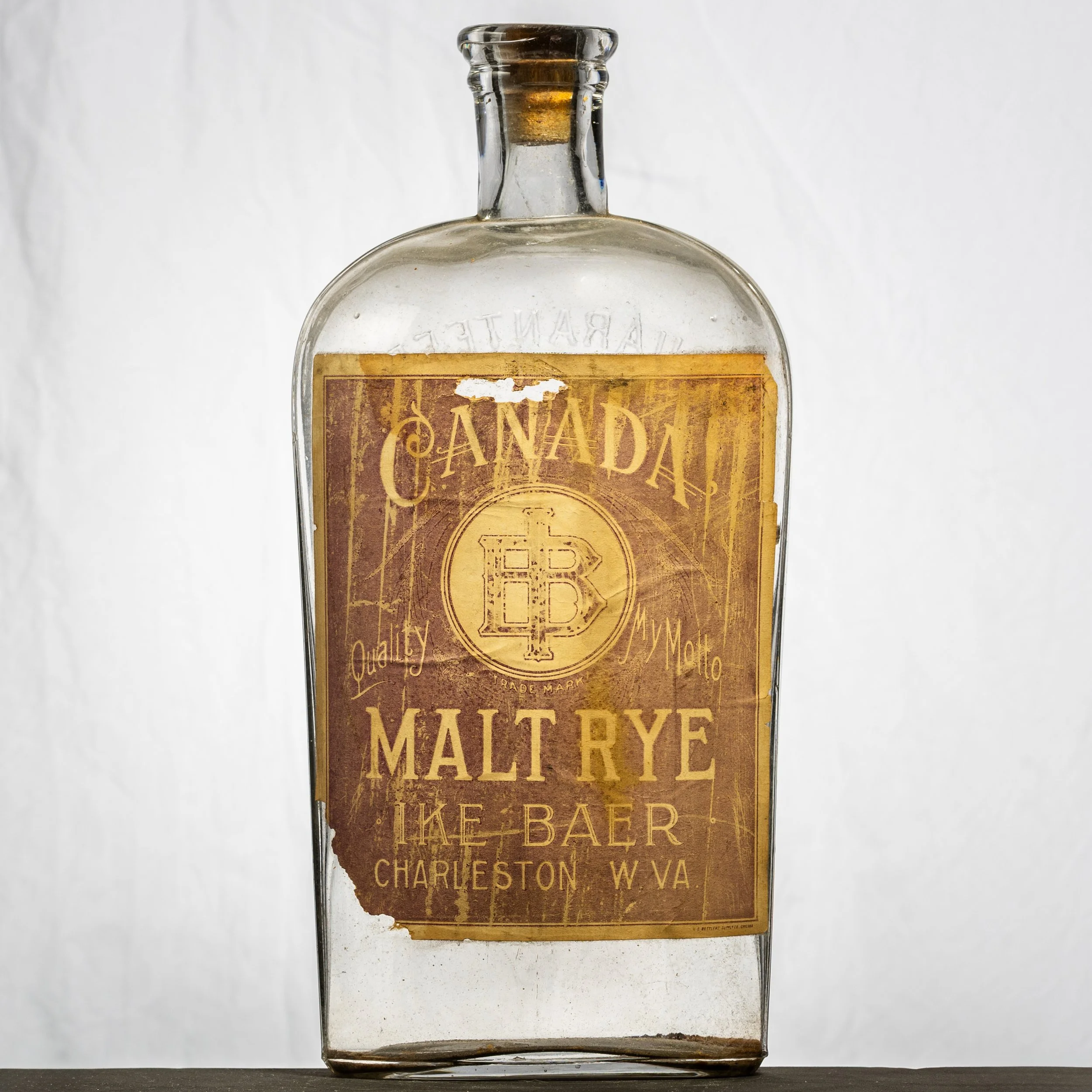 Ike Baer, Canada Malt Rye Whiskey, Charleston paper label whiskey bottle. Different bottle mold, same whiskey.