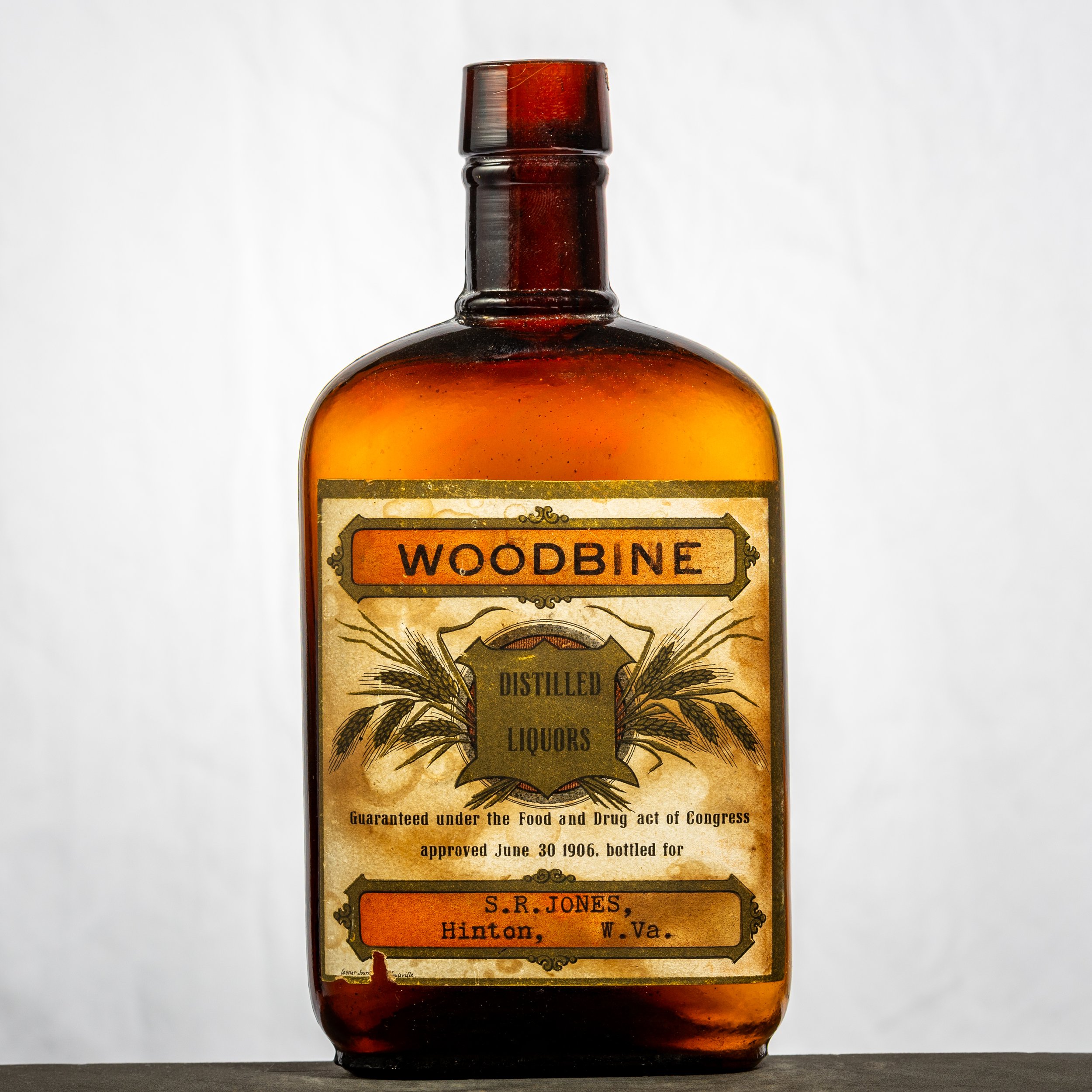 Woodbine Distilled Liquors pint maybe.jpg