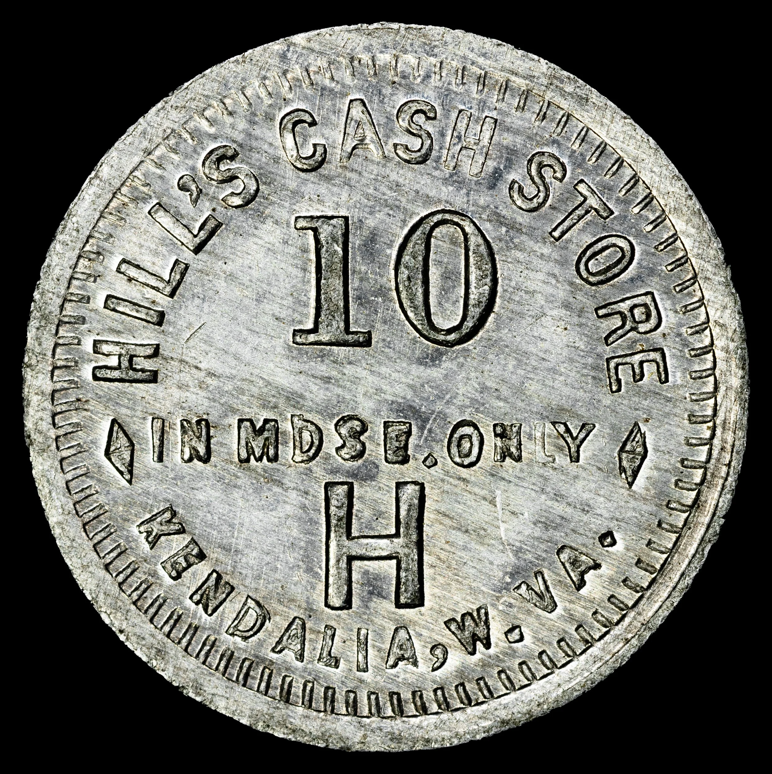 Hill's Cash Store, Kendalia 10¢ lumber scrip token. Obverse.