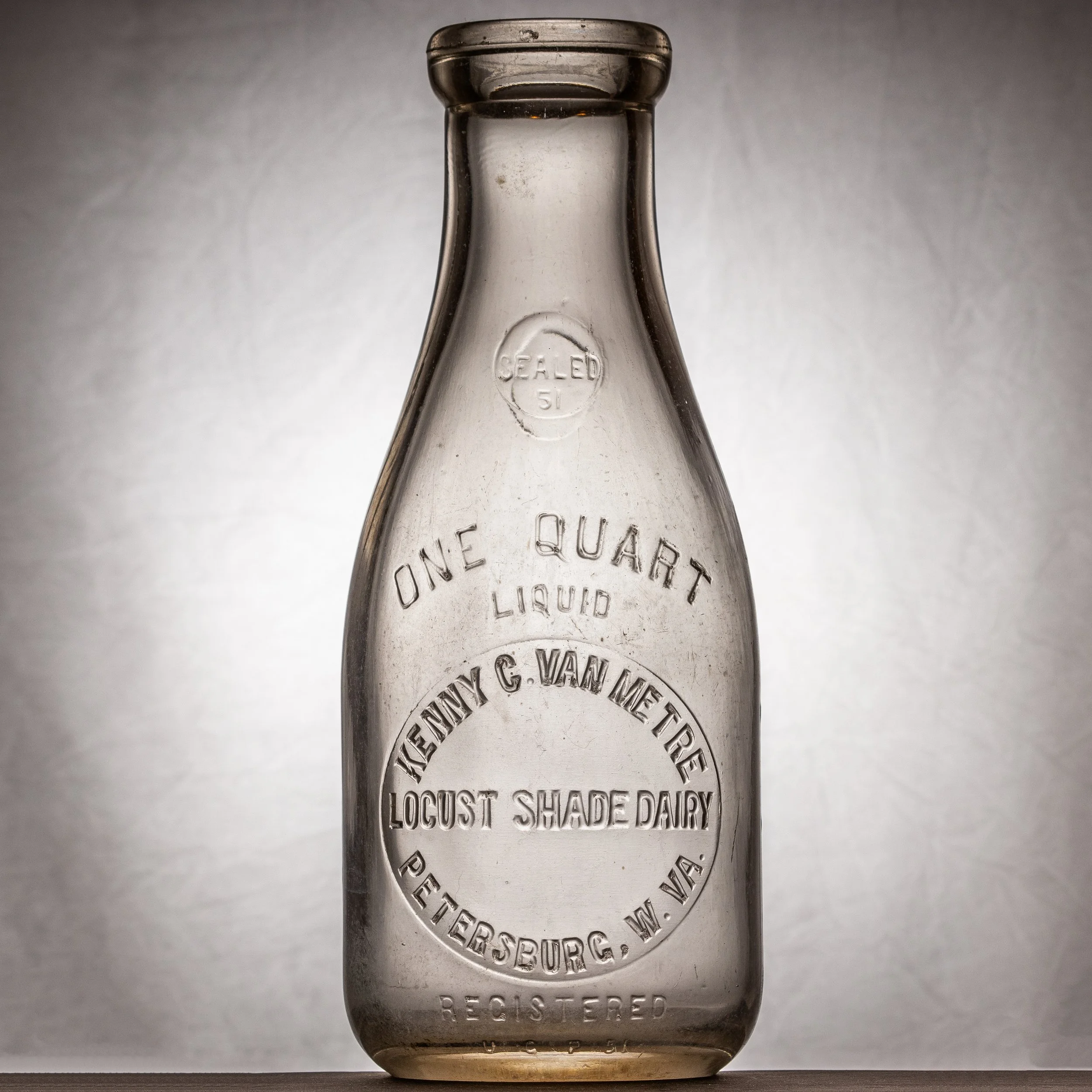 Locust Shade Dairy, Kenny C. VanMetre, Petersburg milk bottle. Quart, round, embossed.