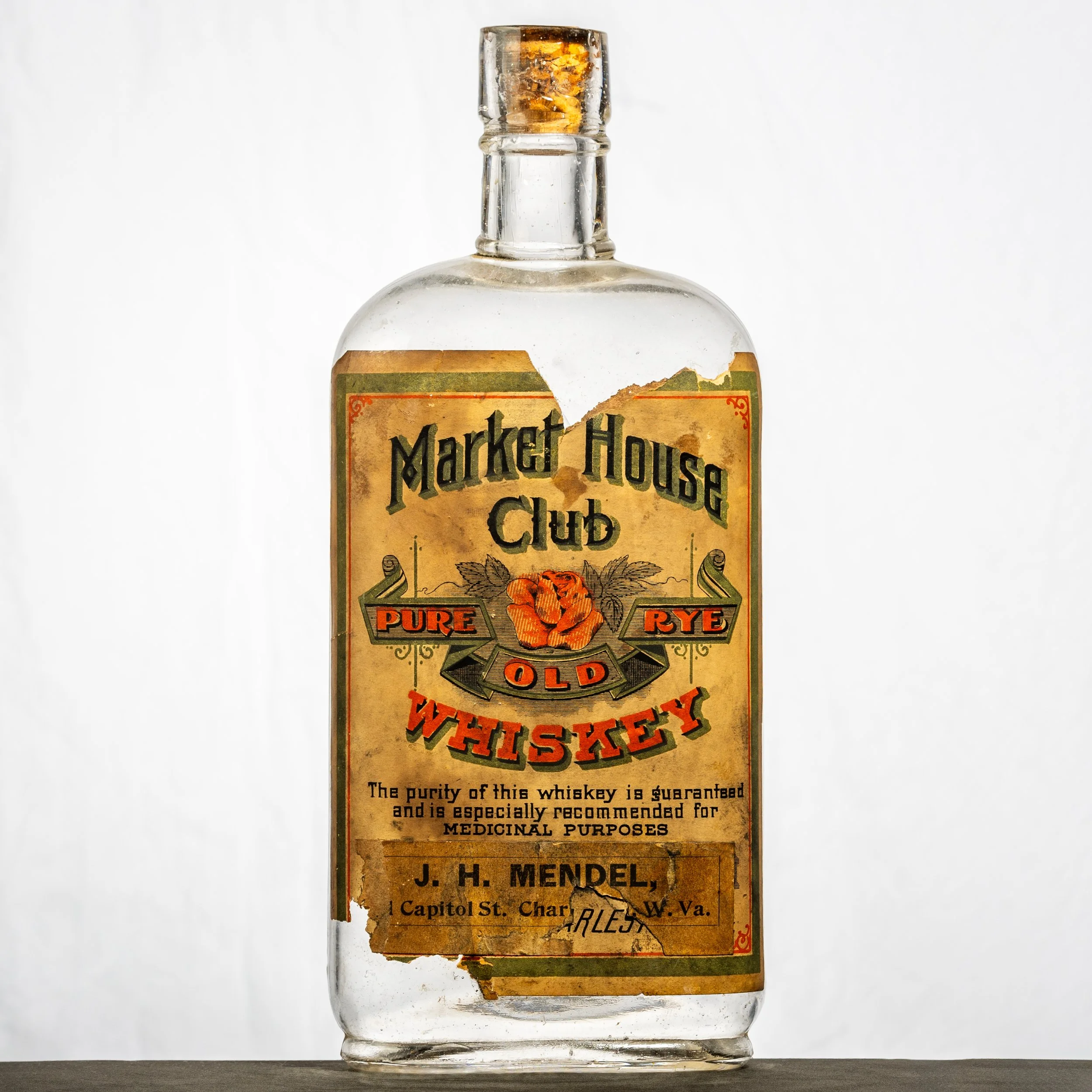J.H. Mendel, Market House Club Pure Old Rye Whiskey, Charleston labeled whiskey bottle.