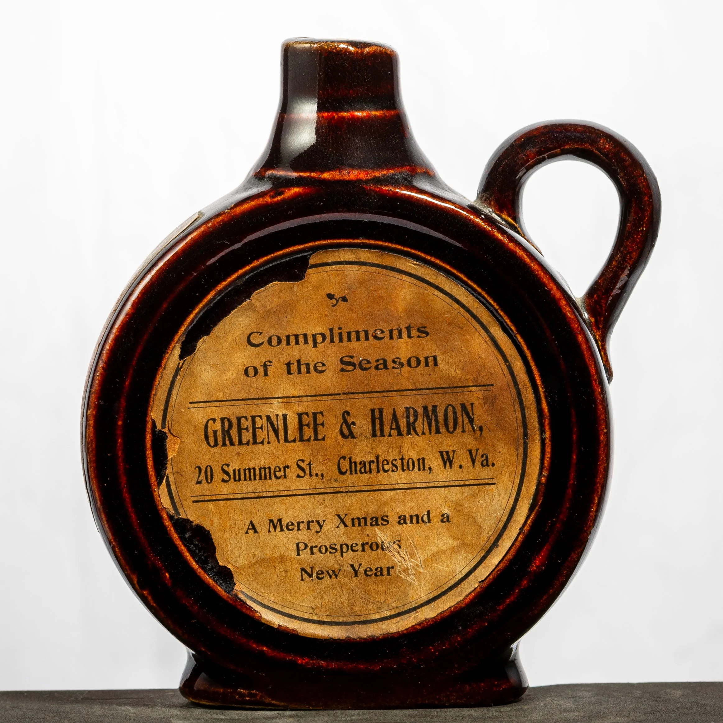 Greenlee & Harmon, Bare Old Perfect Brookfield Rye, Charleston stoneware whiskey bottle. Roughly half-pint size, handled. Front.