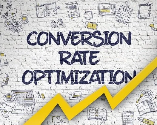 A white brick wall with hand-drawn business sketches and a yellow upward trending arrow. The text reads "Conversion Rate Optimization".