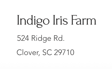 Business card for Indigo Iris Farm with address details.