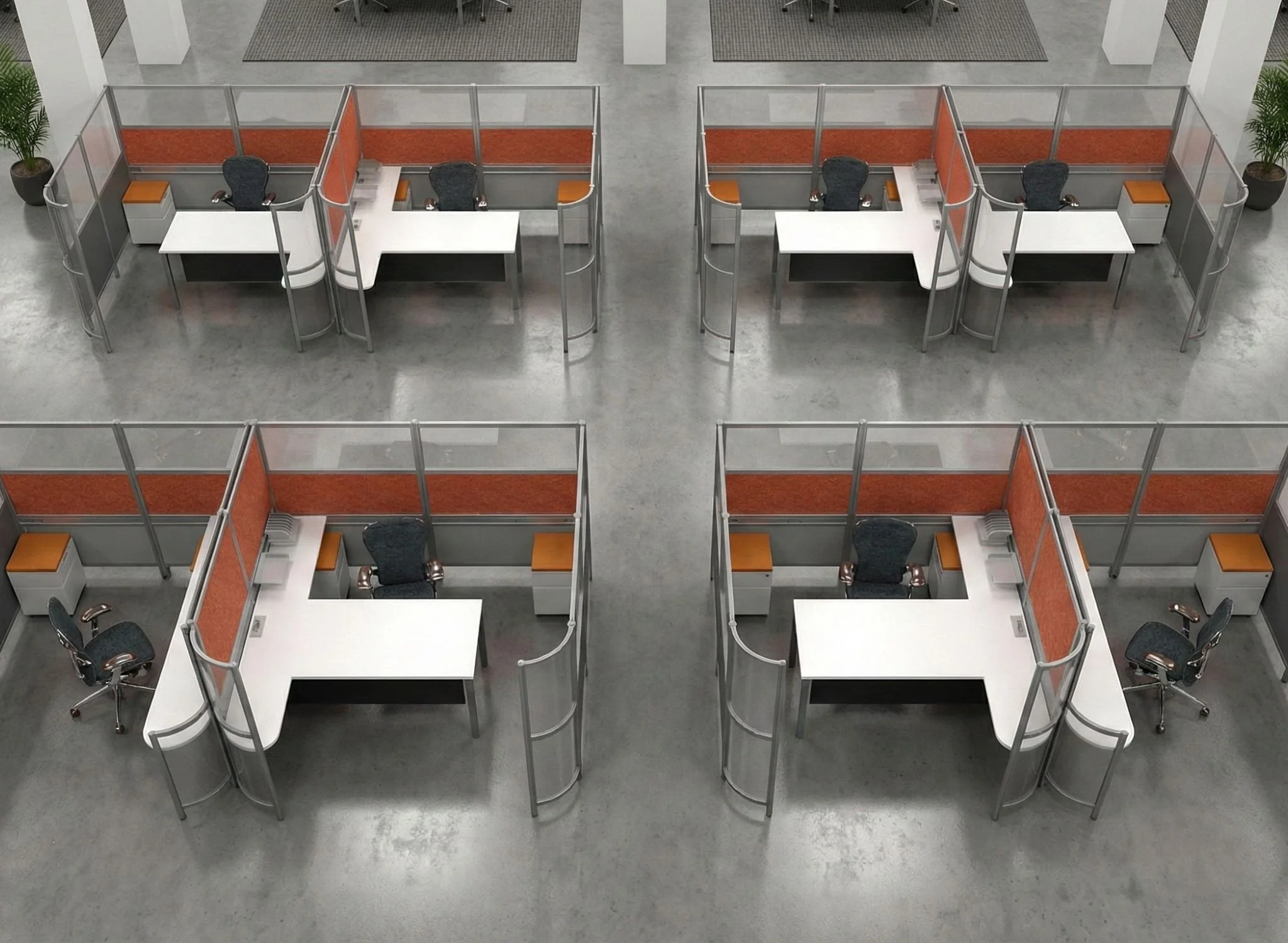 Empty office cubicles arranged in a grid pattern, with black swivel chairs, small side tables, potted plants, and orange privacy panels in an office environment.
