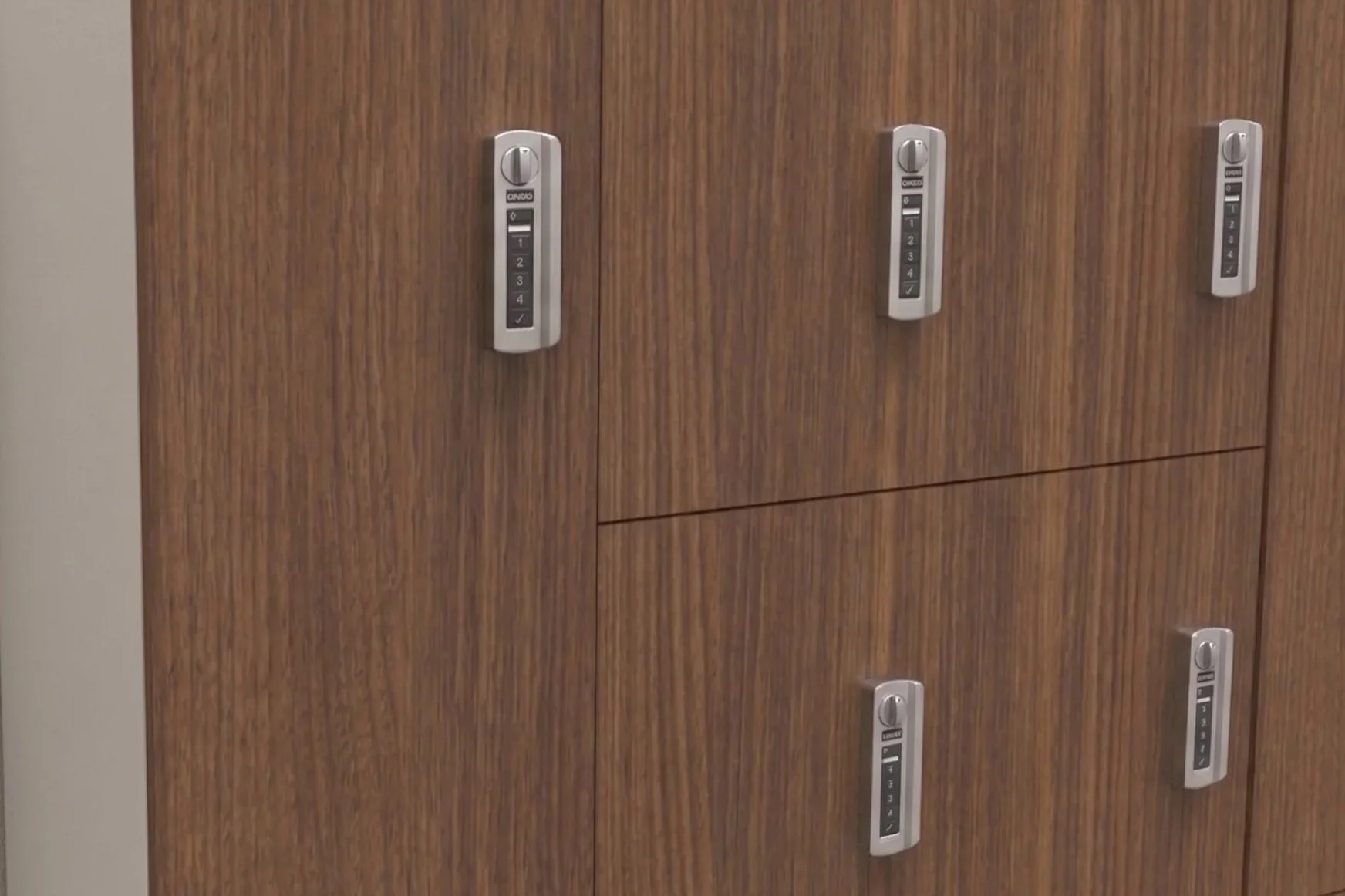 Wooden lockers with electronic lock keypads.