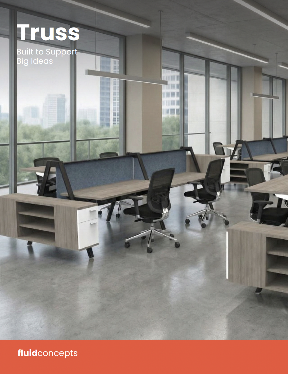 Modern office space with large windows, desks, and ergonomic chairs.