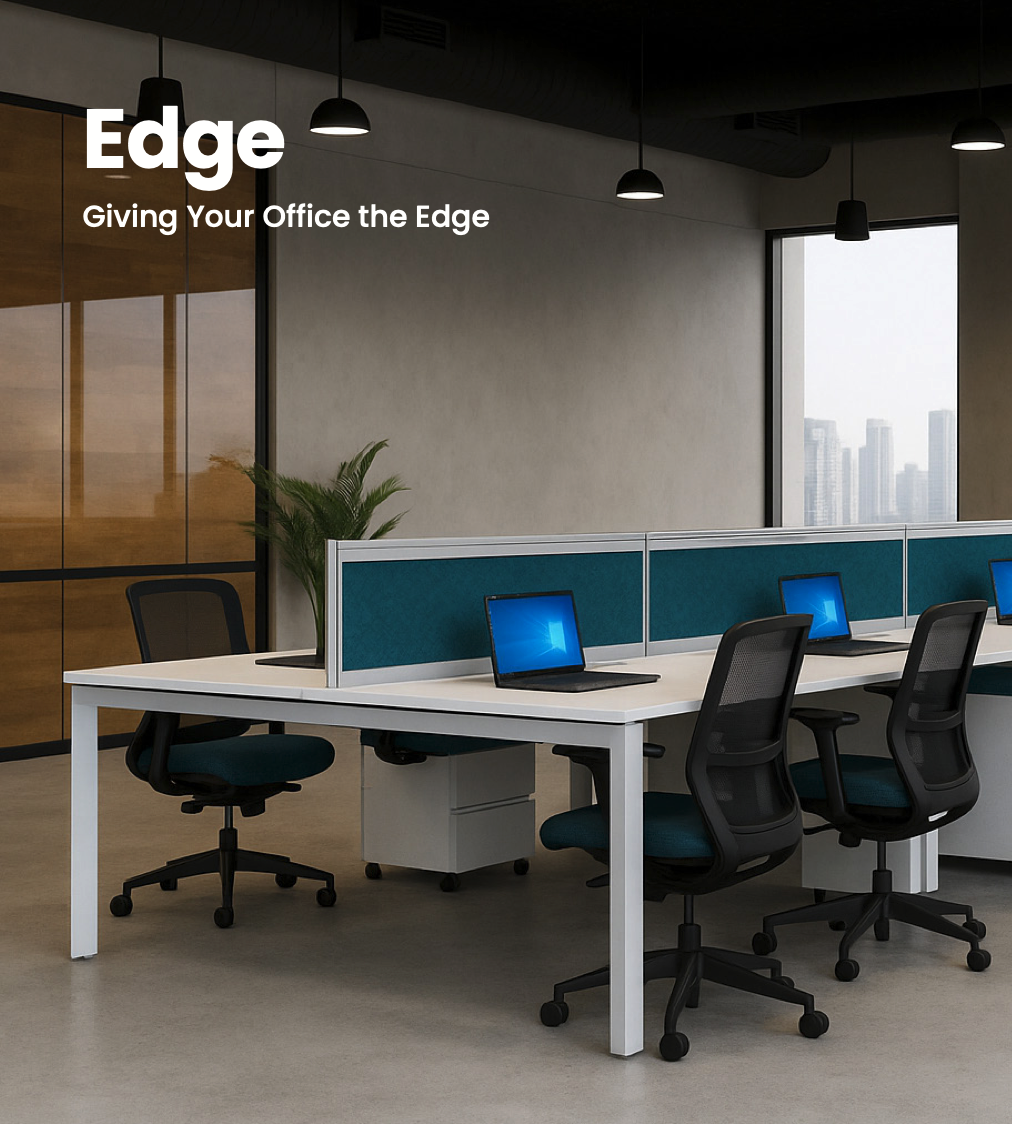 Modern office space with four workstations, each with a laptop, black office chairs, teal divider panels, and a large window showing a city skyline.