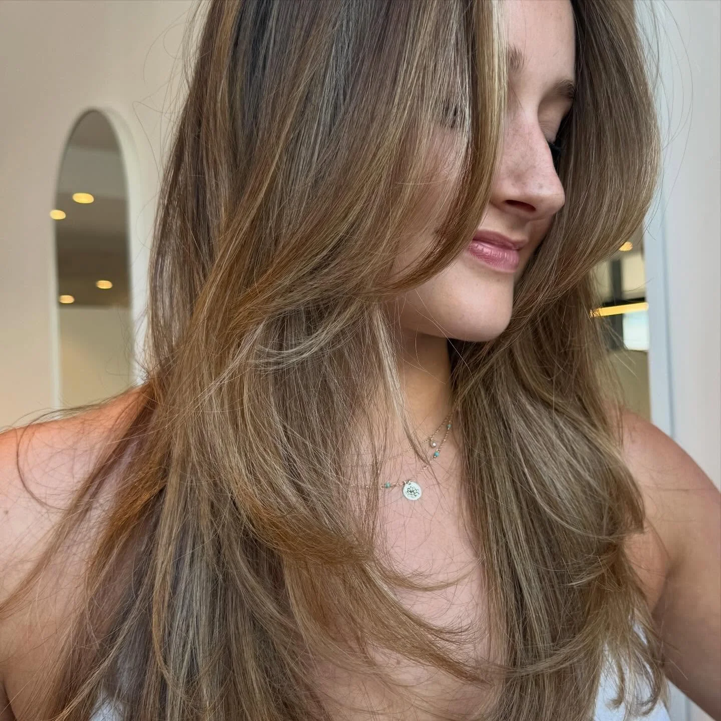 A refined Bronde. 
 
Low effort. 
High shine. 

Created with clean colour technology courtesy of @evopro 🤍