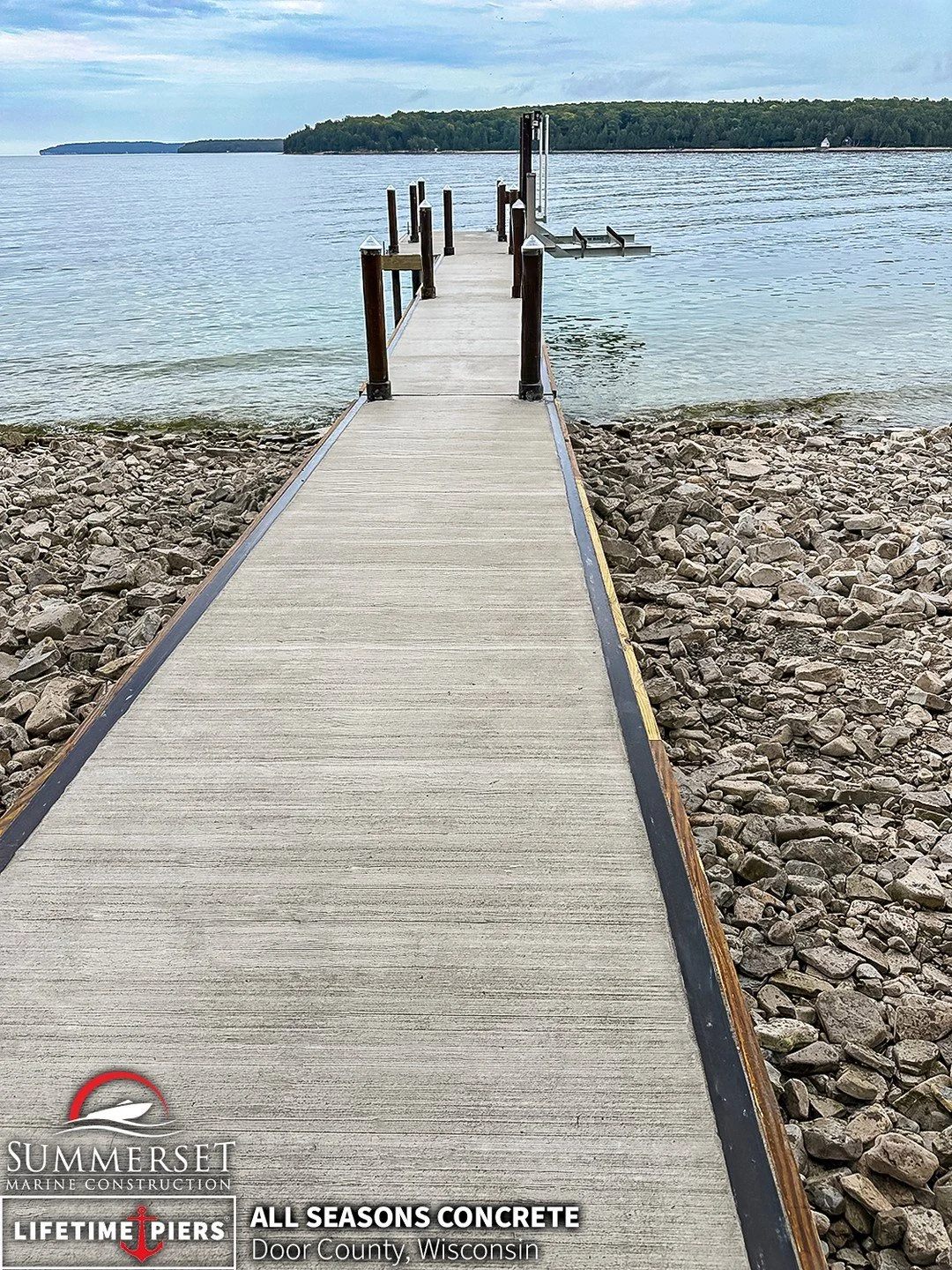 This Lifetime All Seasons Concrete pier blends effortlessly into the shoreline &mdash; a structure that honors the view, while standing up to everything Lake Michigan delivers. Quiet durability, crafted to last for generations.

Learn more using the 