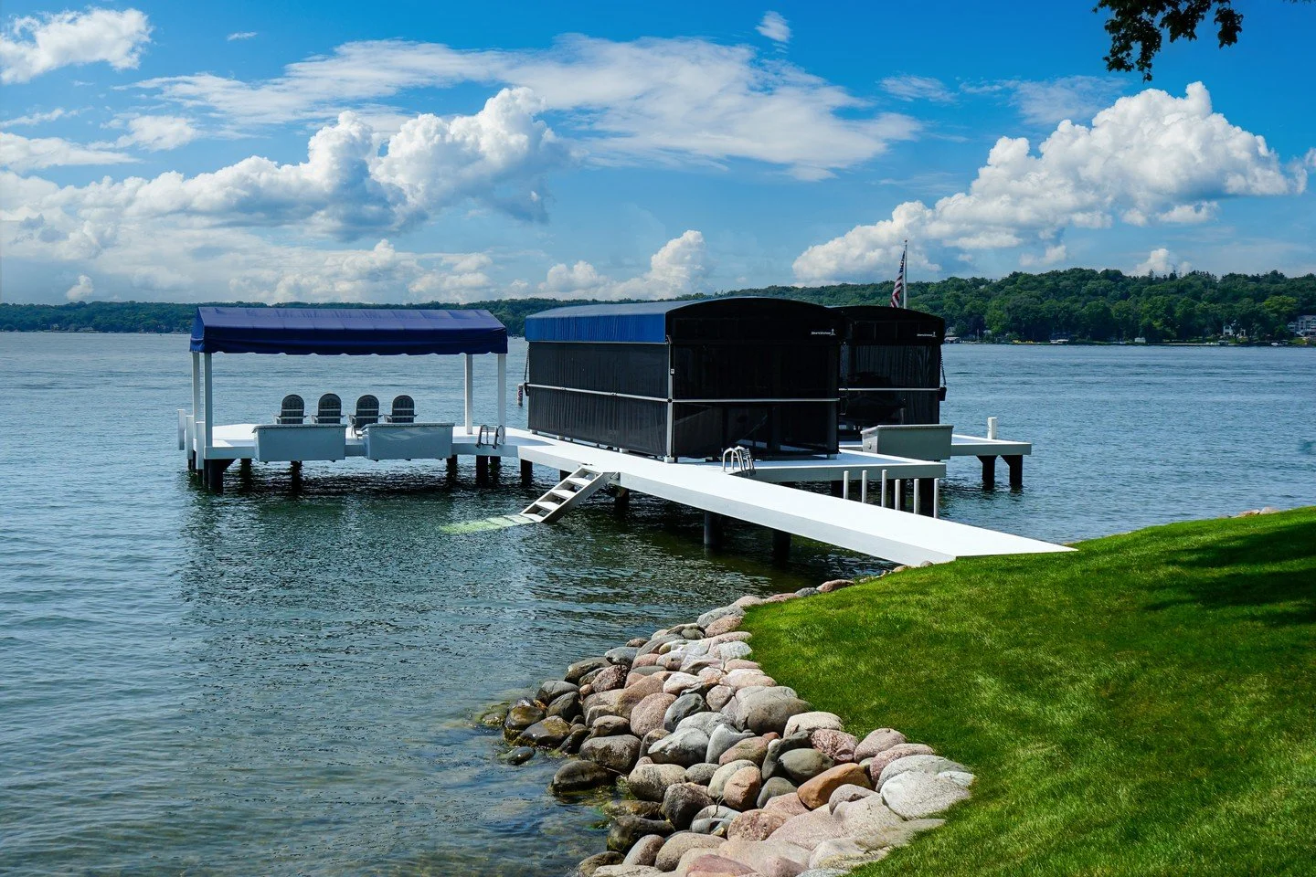 This is the kind of shoreline you don&rsquo;t stop using.

Our Lifetime All Seasons HD pier on Pewaukee Lake brings the whole day together, easy walk-out access, a covered lift for protection, and eco-friendly HDPE decking that won&rsquo;t have you s
