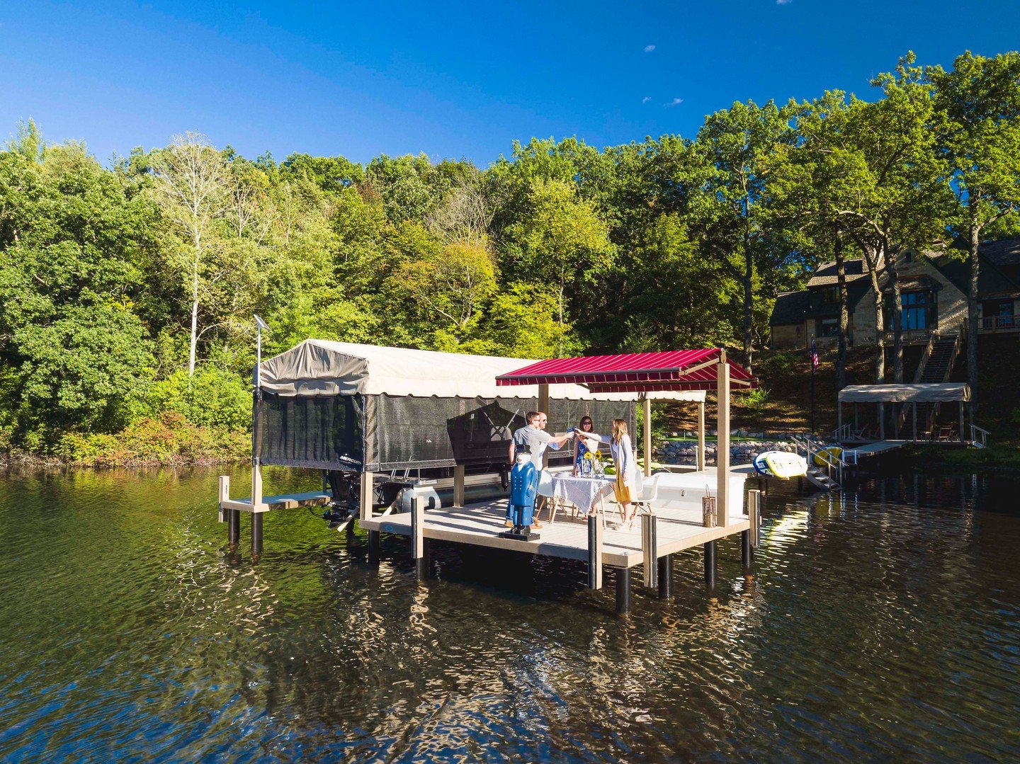This is what a real lake day looks like.

A Lifetime All Seasons Pier gives you space to grill, gather, and linger a little longer, with a solid footing under you and the water right at the edge of the conversation. It is the kind of setup that makes