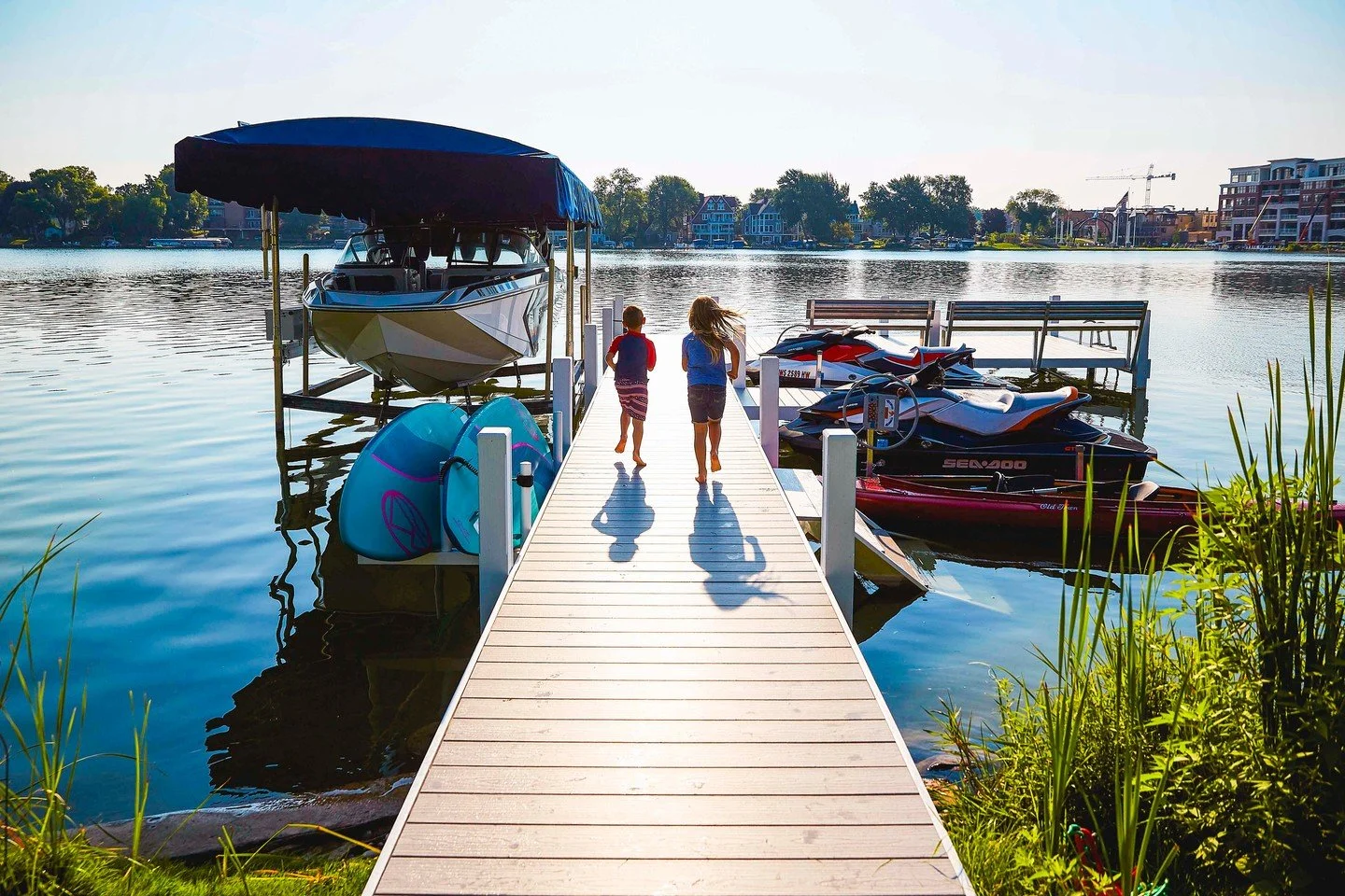 Memorial Day Weekend starts right here.

Two kids running the pier and the Sea Doo sitting at the edge of the water like it is asking to go first. A Lifetime Classic Pier gives you that simple, ready-for-anything shoreline, with eco-friendly HDPE dec