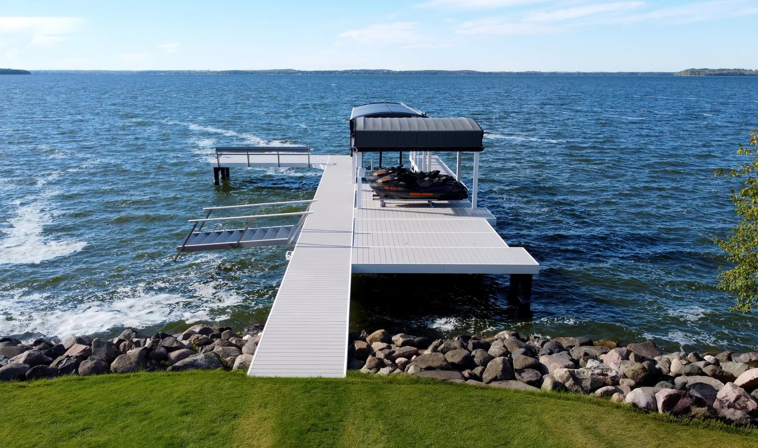 Lifetime All Seasons HD Pier on Lake Mendota with built-in covered lift and permanent steel construction