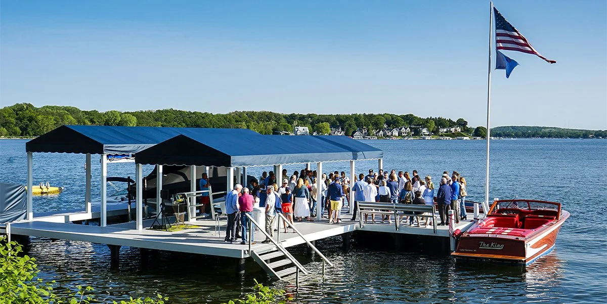 Lifetime All Seasons HD Pier on Geneva Lake featuring covered boat slips, steel pier construction, and year-round waterfront access