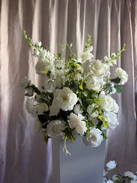 tall white arrangements $100