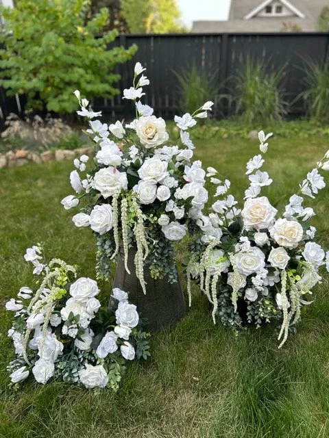 drapery white arrangements $100 ea 