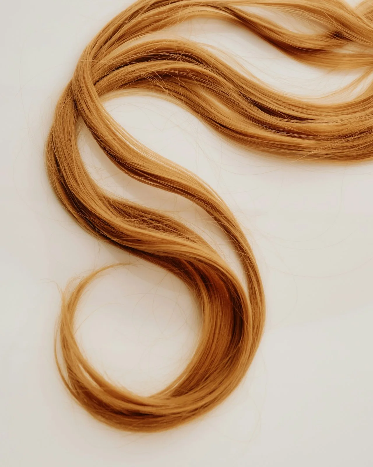 Woman wearing an undereye patch for skincare, representing the body spa and medi esthetics program at JCI.